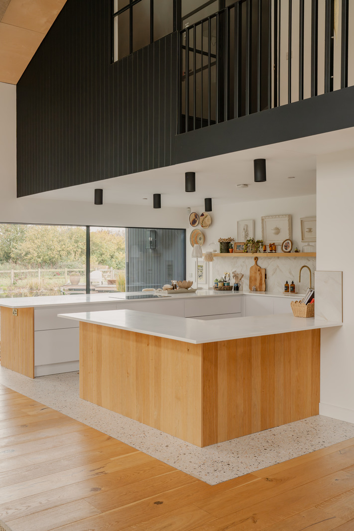 kitchen with mezzanine contemporary decor converted barn in England
