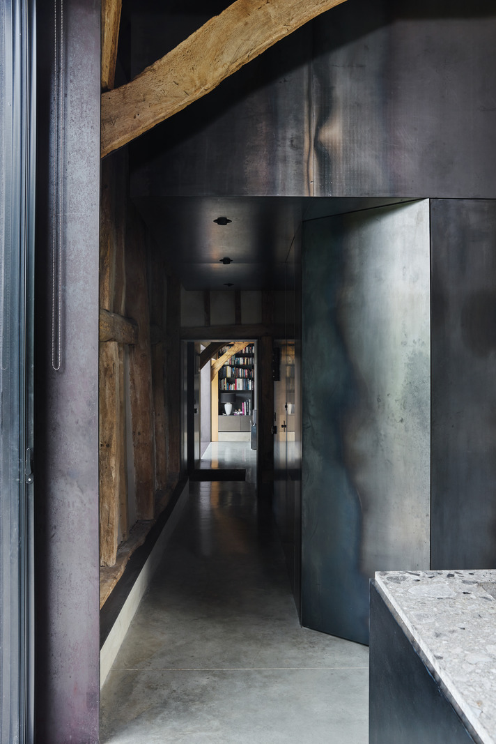 hallway with beams contemporary decor former English barn renovated