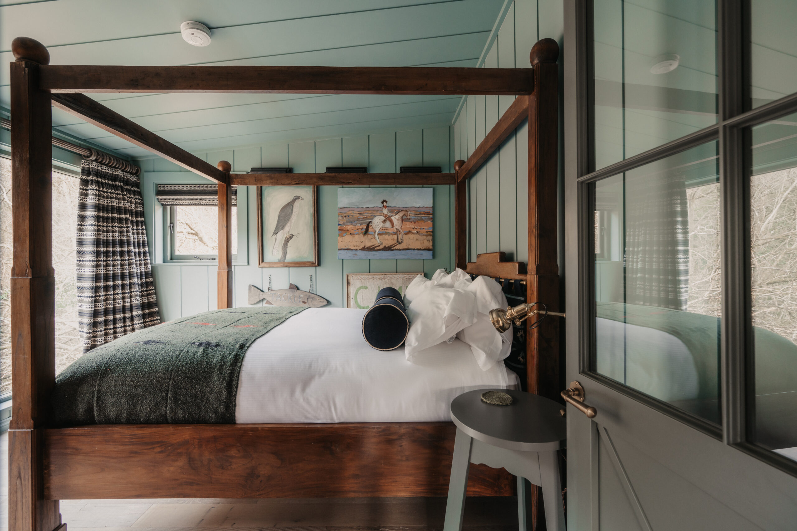 bedroom with four-poster bed dark rustic chic decor small English cottage UKAI by HÁM Interiors
