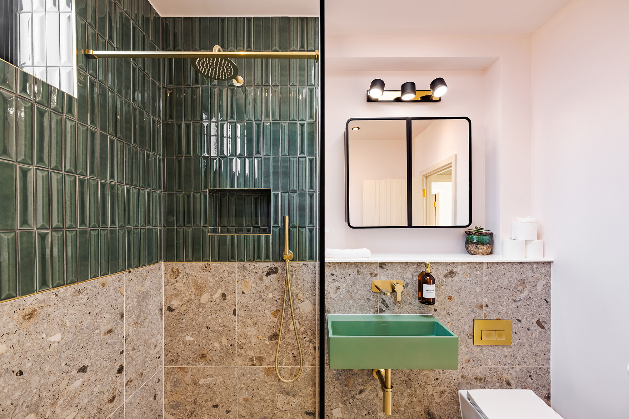 contemporary green and marble bathroom