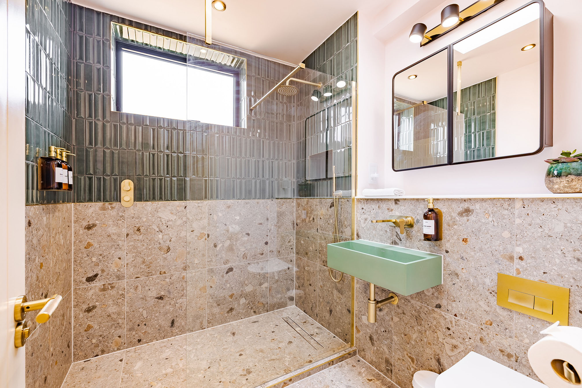 contemporary green and marble bathroom