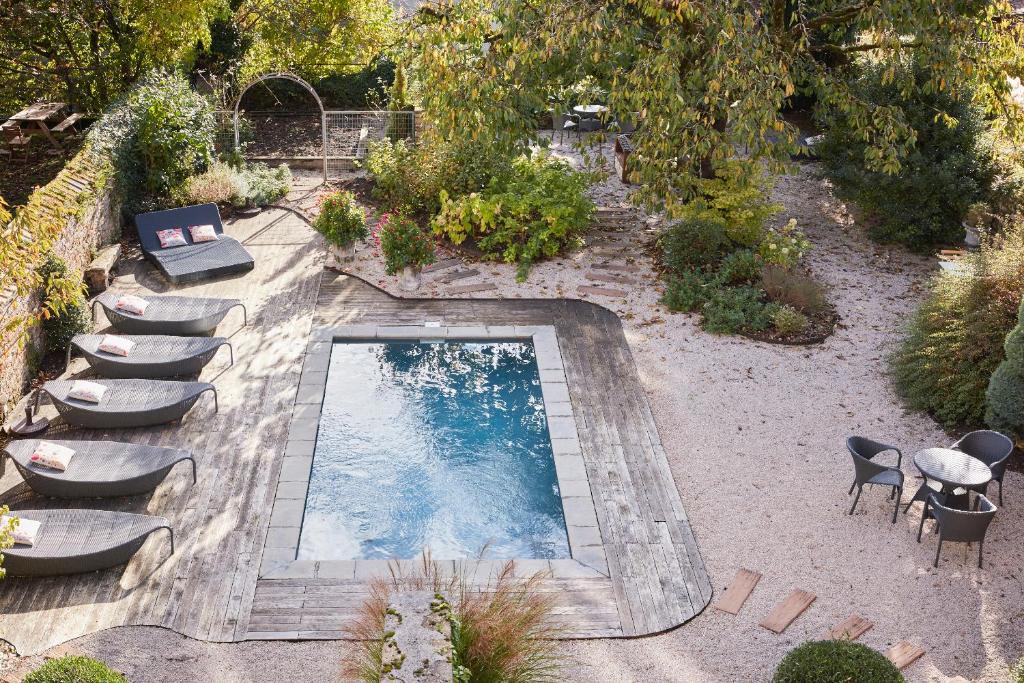 garden with salted pool 18th-century house France Arbois Jura La Closerie des Capucines