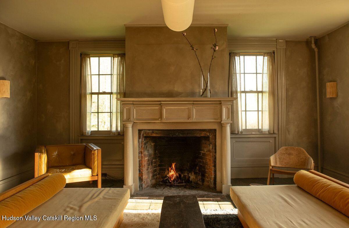 living room with period fireplace Hudson Valley Home Garrett Stickles House living room with period fireplace Hudson Valley Home Garrett Stickles House