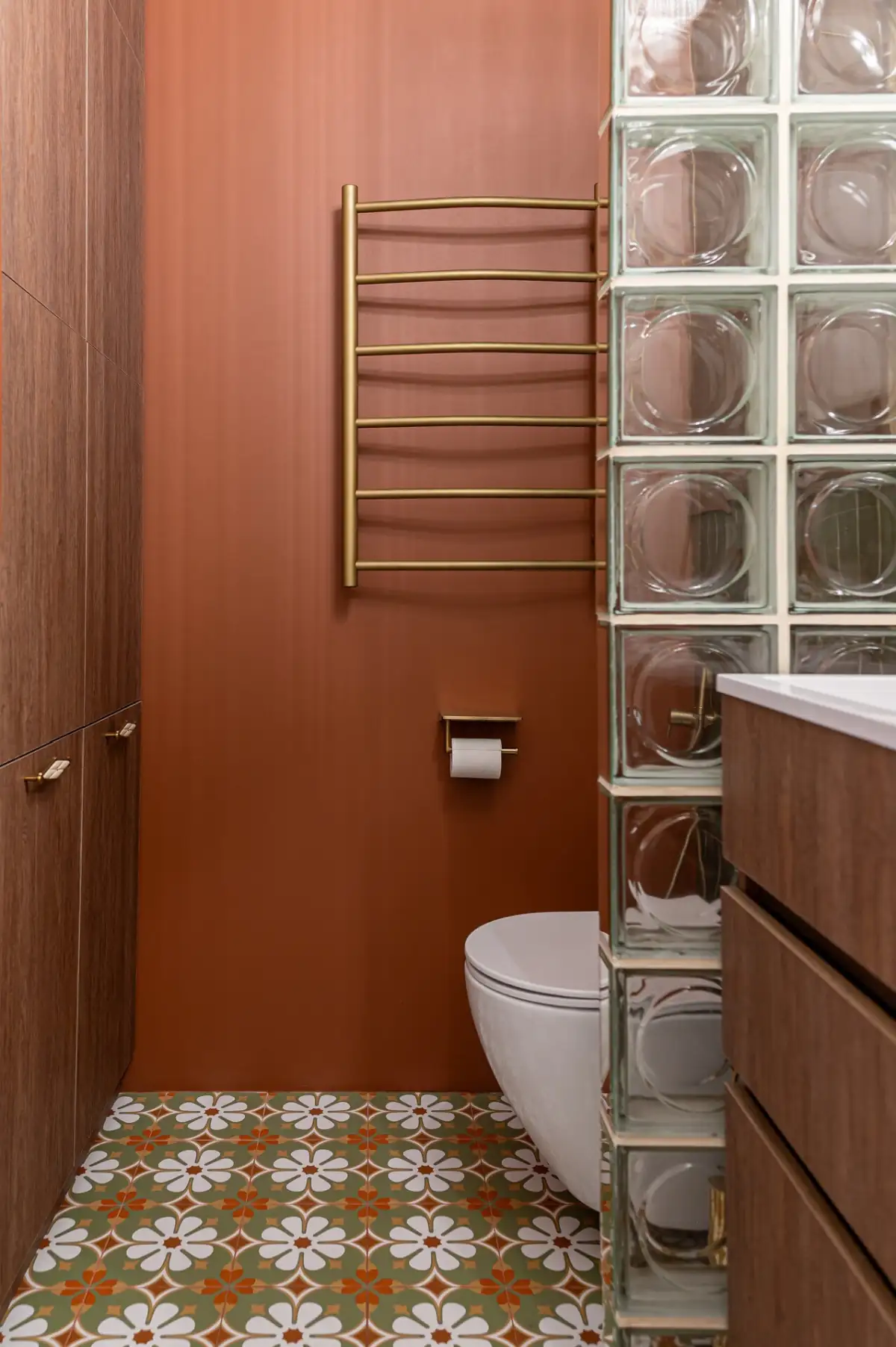 orange and green bathroom with cement tiles and glass blocks orange and green bathroom with cement tiles and glass blocks