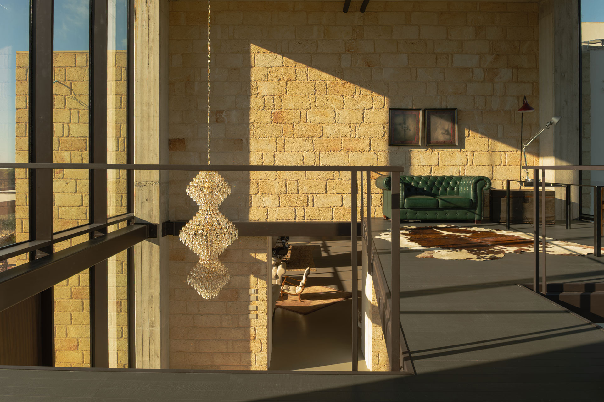 living room on mezzanine stone walls house in Puglia contemporary interior design masseria Li Cafari living room on mezzanine stone walls house in Puglia contemporary interior design masseria Li Cafari