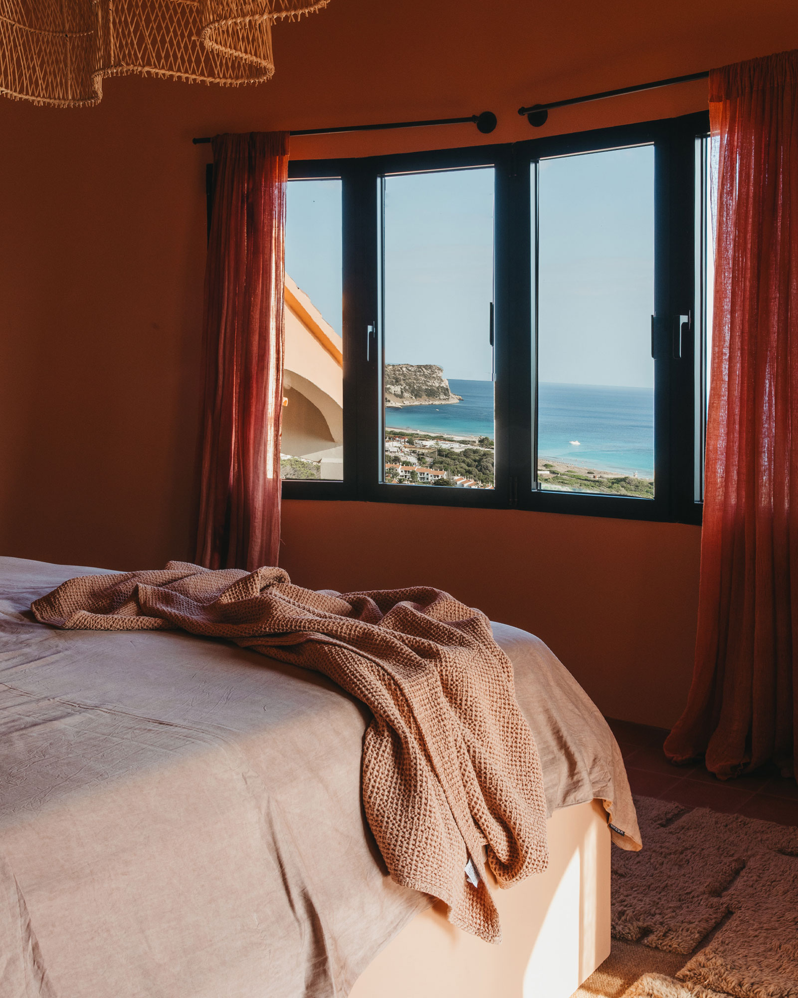 terracotta bedroom sea view Mediterranean house contemporary decor El Puente Al Amor Menorca