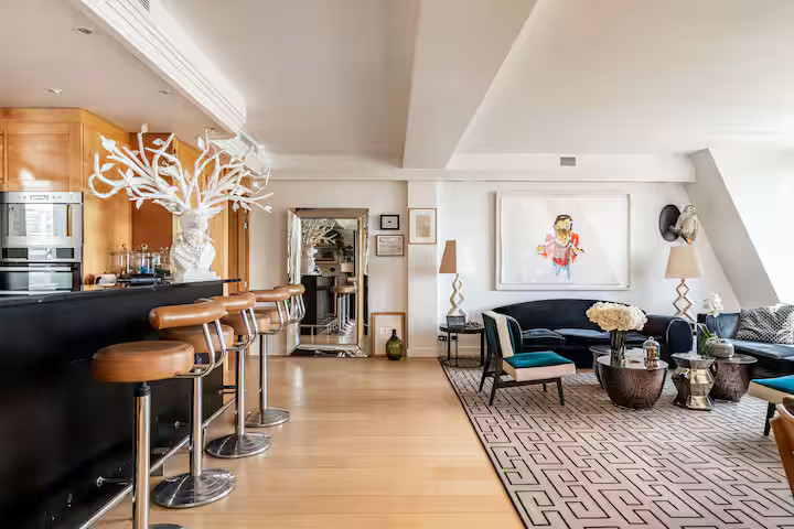 living room with open kitchen contemporary decor apartment Paris with rooftop and view on the Eiffel tower living room with open kitchen contemporary decor apartment Paris with rooftop and view on the Eiffel tower