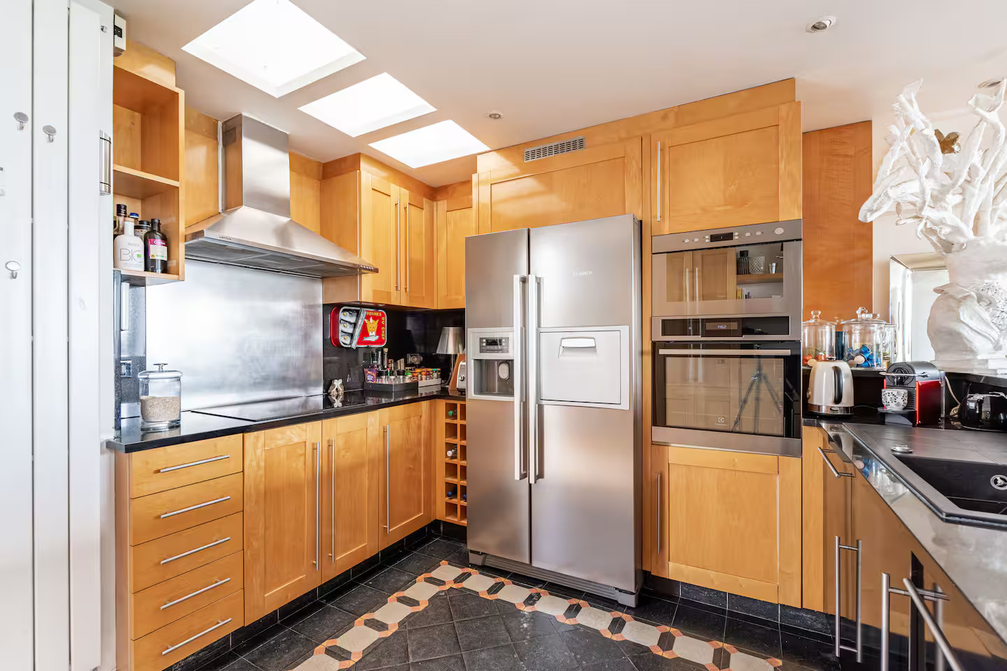 open kitchen contemporary decor apartment Paris with rooftop and view on the Eiffel tower open kitchen contemporary decor apartment Paris with rooftop and view on the Eiffel tower