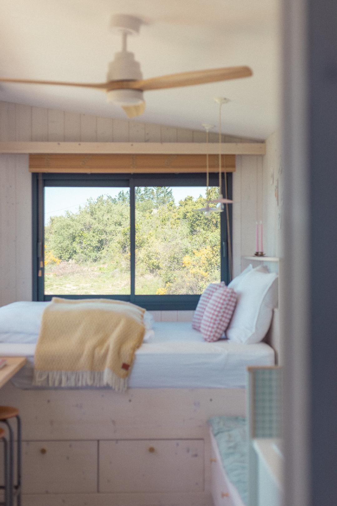 bed on a podium tiny house Pepiite Gorges de l bed on a podium tiny house Pepiite Gorges de l'Ardèche by Plume Habitat