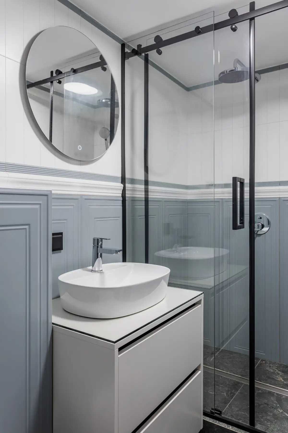 light blue gray bathroom with shower Parisian style