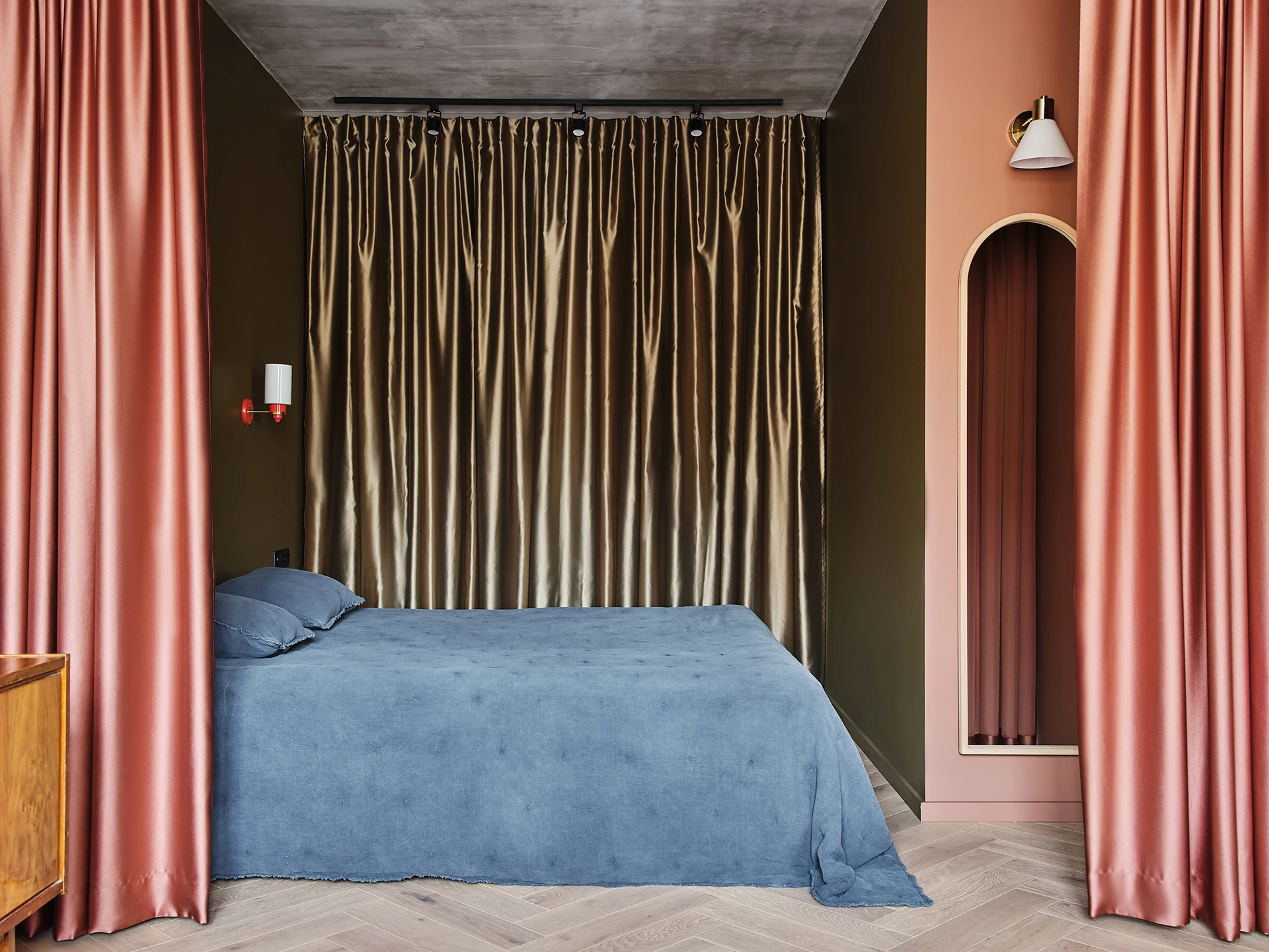 open bedroom closed with a curtain colored contemporary decor