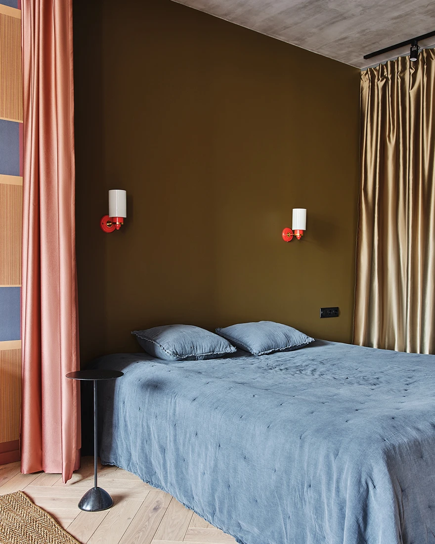 open bedroom closed with a curtain colored contemporary decor