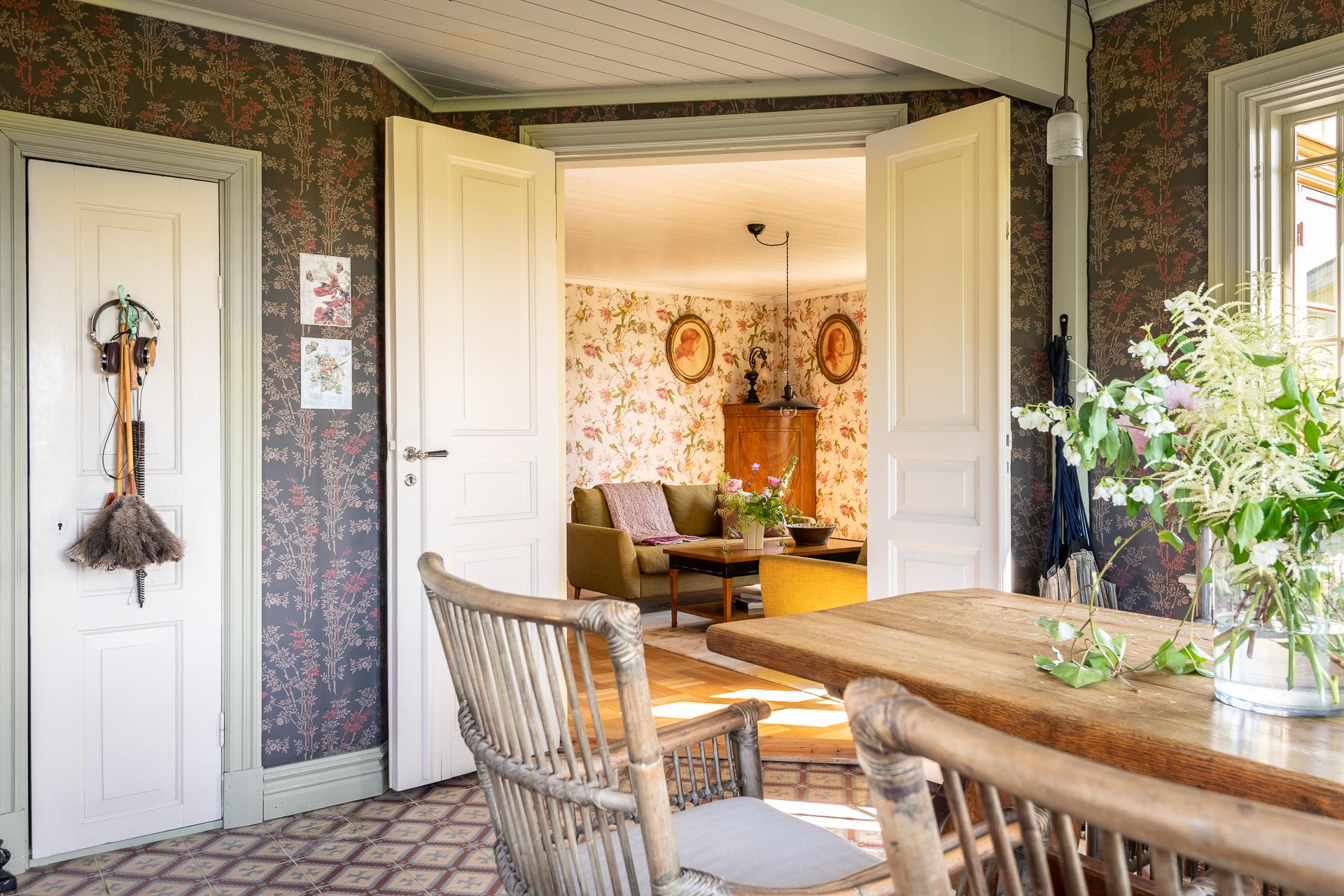 dining room in veranda with Marrakech artisanal cement tiles scandinavian decor