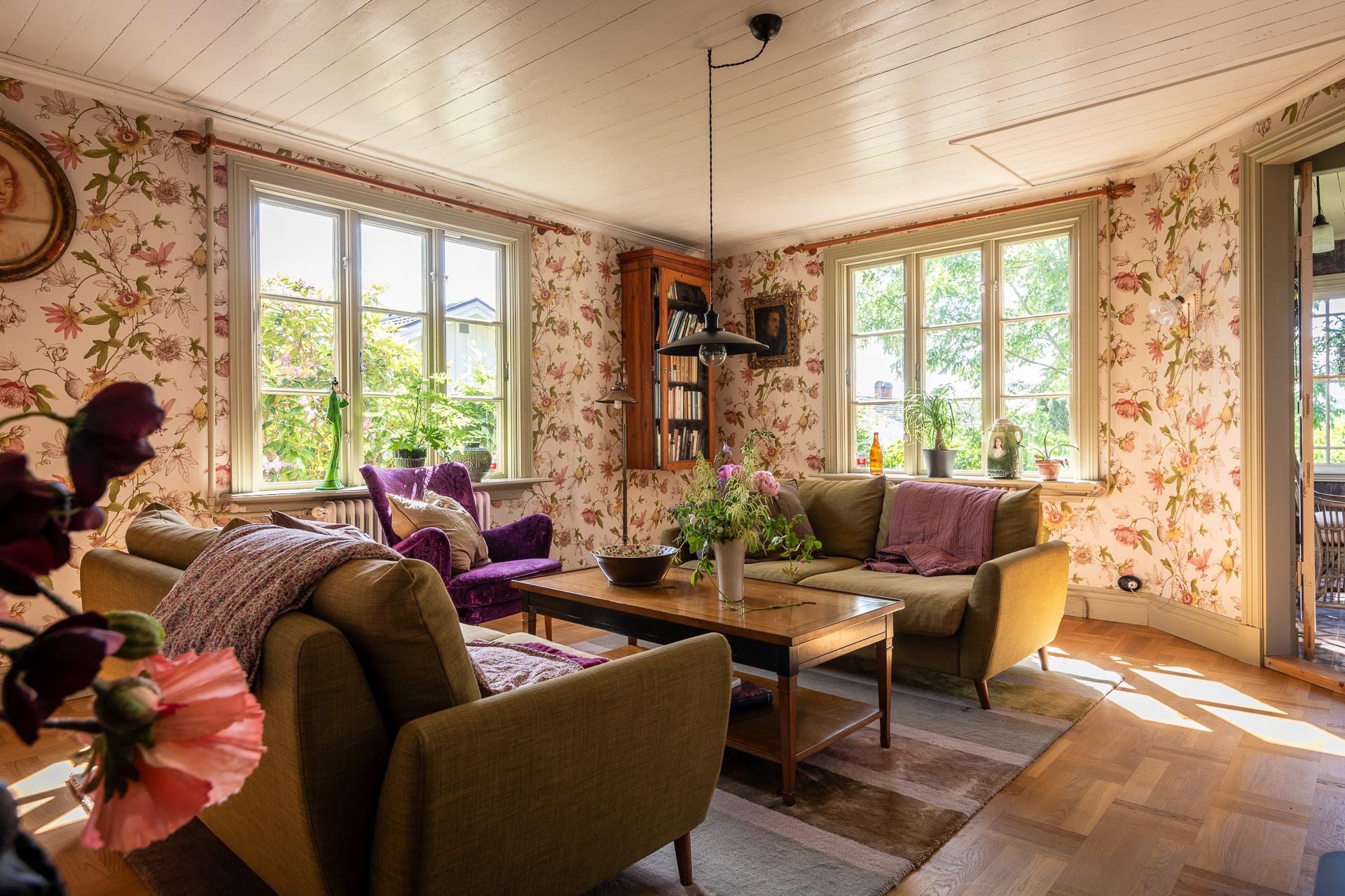 living room with floral wallpaper scandinavian decor