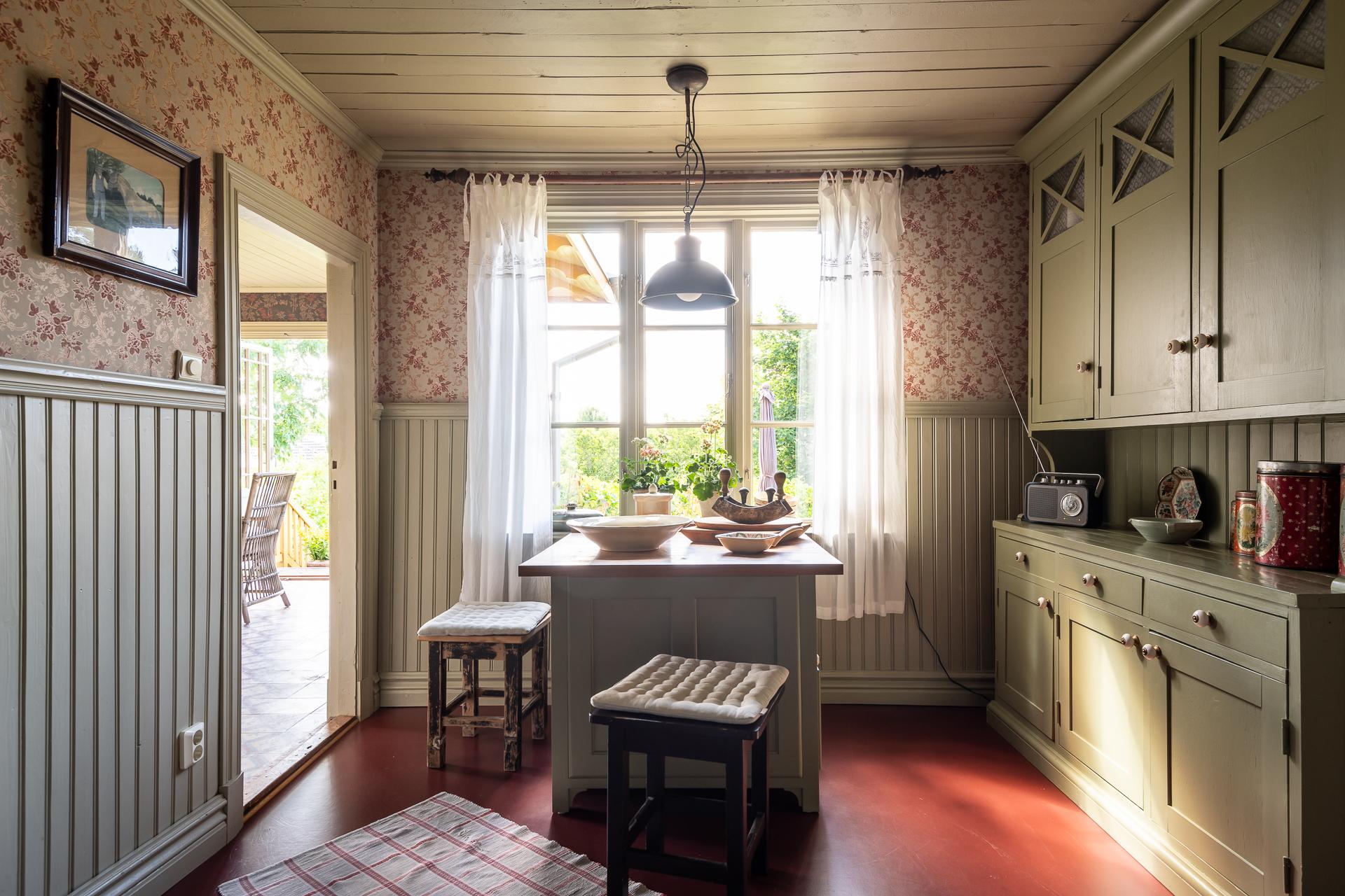 sage green kitchen with scandinavian decor
