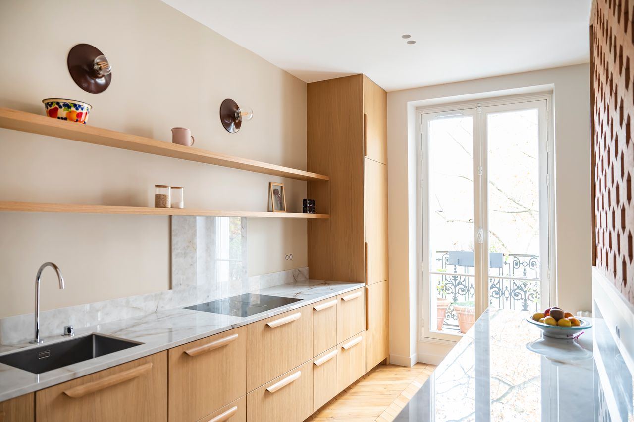 kitchen with Hives brick screen by Mutina renovated Haussmann-style apartment Paris Photo: © Julien Pépy