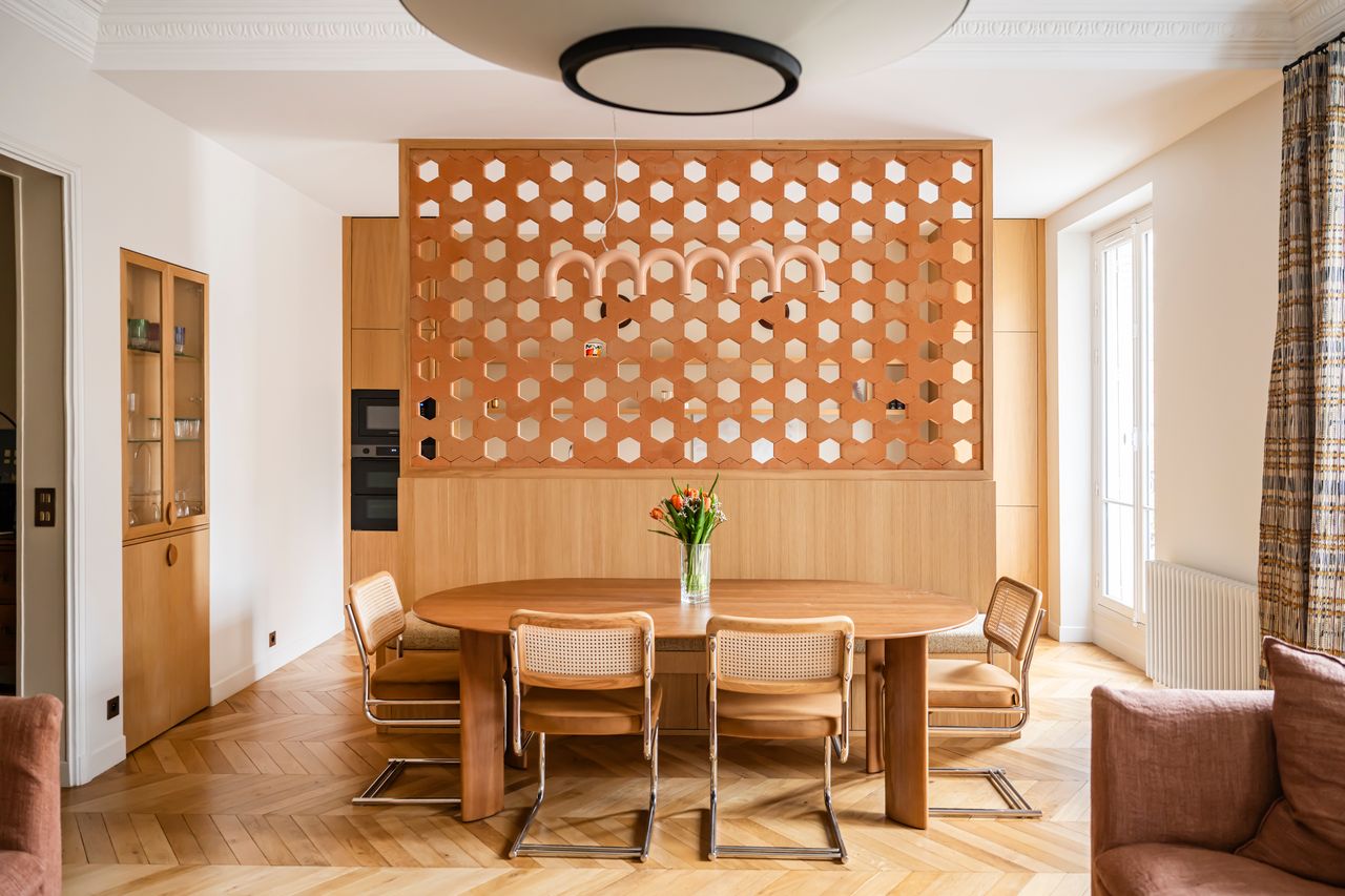 dining room with moldings and Hives brick screen by Mutina renovated Haussmann-style apartment Paris Photo: © Julien Pépy
