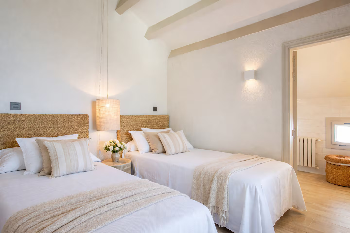bedroom with two beds ans beams stone house with pool contemporary decor Villa Sant Jaume Tossa de Mar Costa Brava Spain bedroom with two beds ans beams stone house with pool contemporary decor Villa Sant Jaume Tossa de Mar Costa Brava Spain
