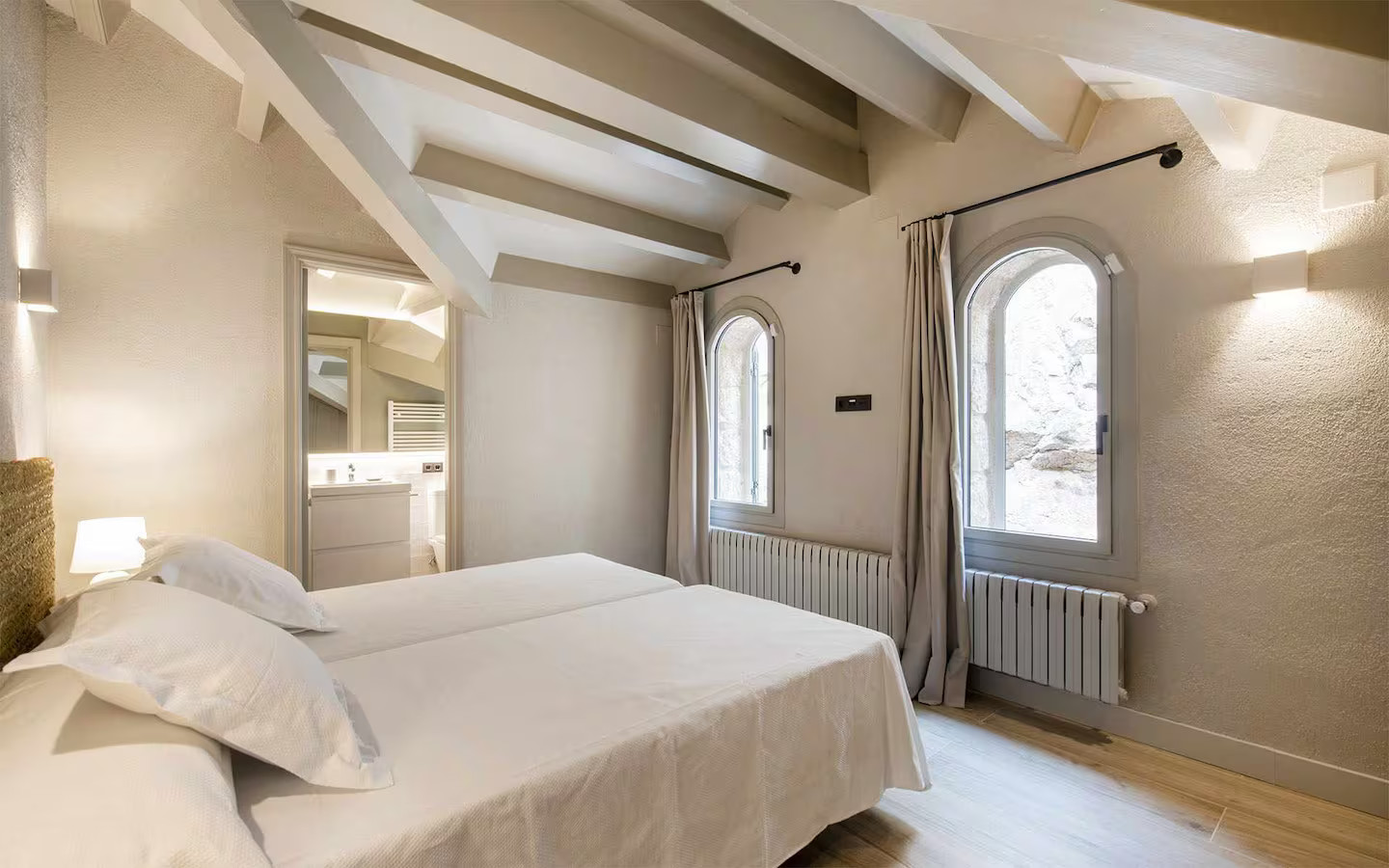 bedroom with beams stone house with pool contemporary decor Villa Sant Jaume Tossa de Mar Costa Brava Spain bedroom with beams stone house with pool contemporary decor Villa Sant Jaume Tossa de Mar Costa Brava Spain