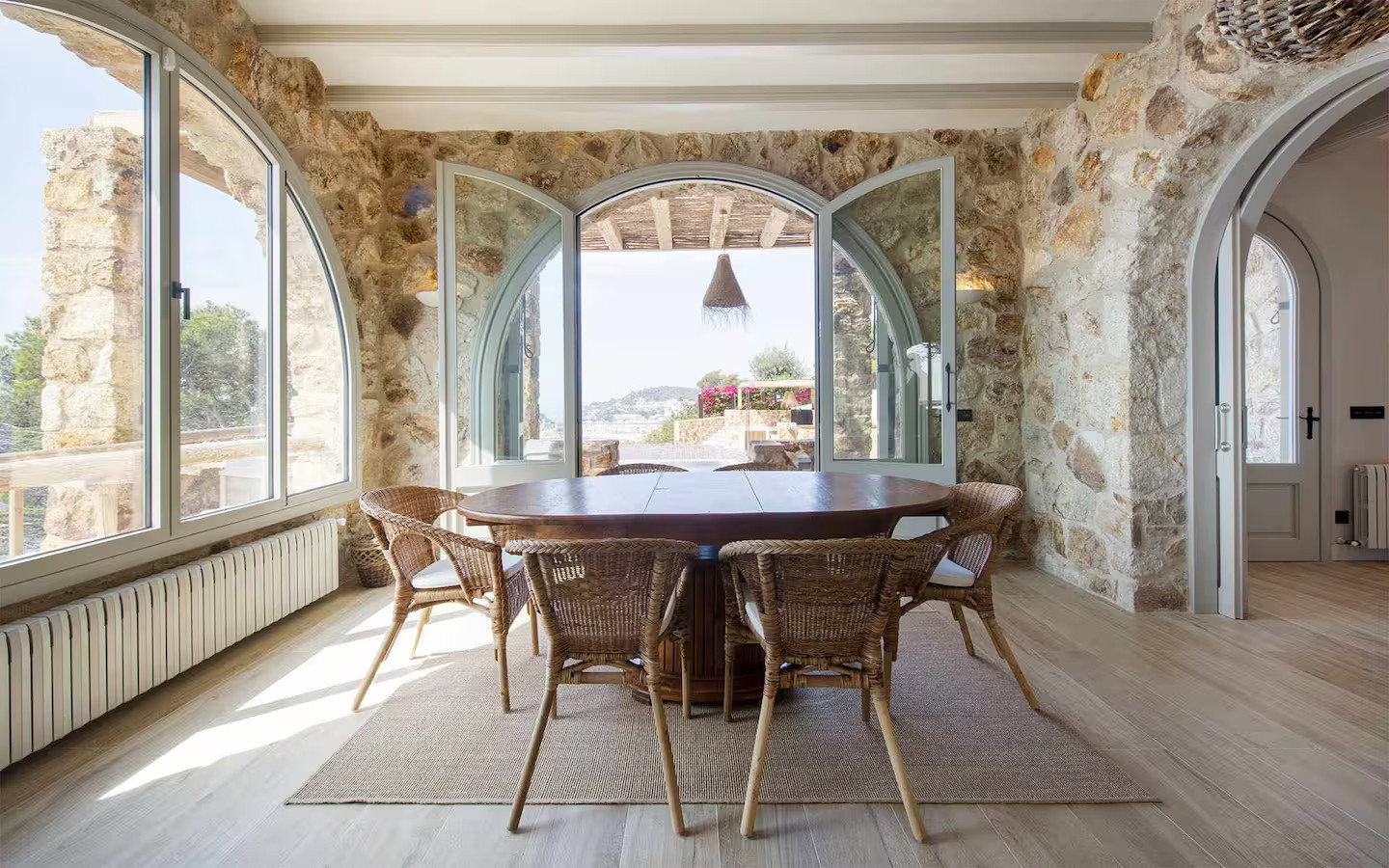 dining room stone walls stone house with pool contemporary decor Villa Sant Jaume Tossa de Mar Costa Brava Spain dining room stone walls stone house with pool contemporary decor Villa Sant Jaume Tossa de Mar Costa Brava Spain