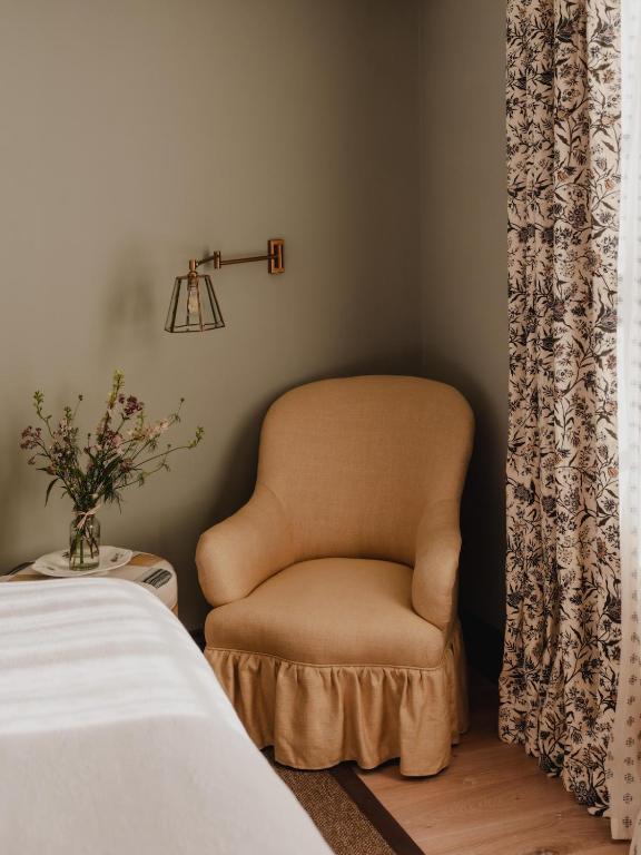 bedroom light green walls charming 56sqm apartment in Cotswolds classic chic decor