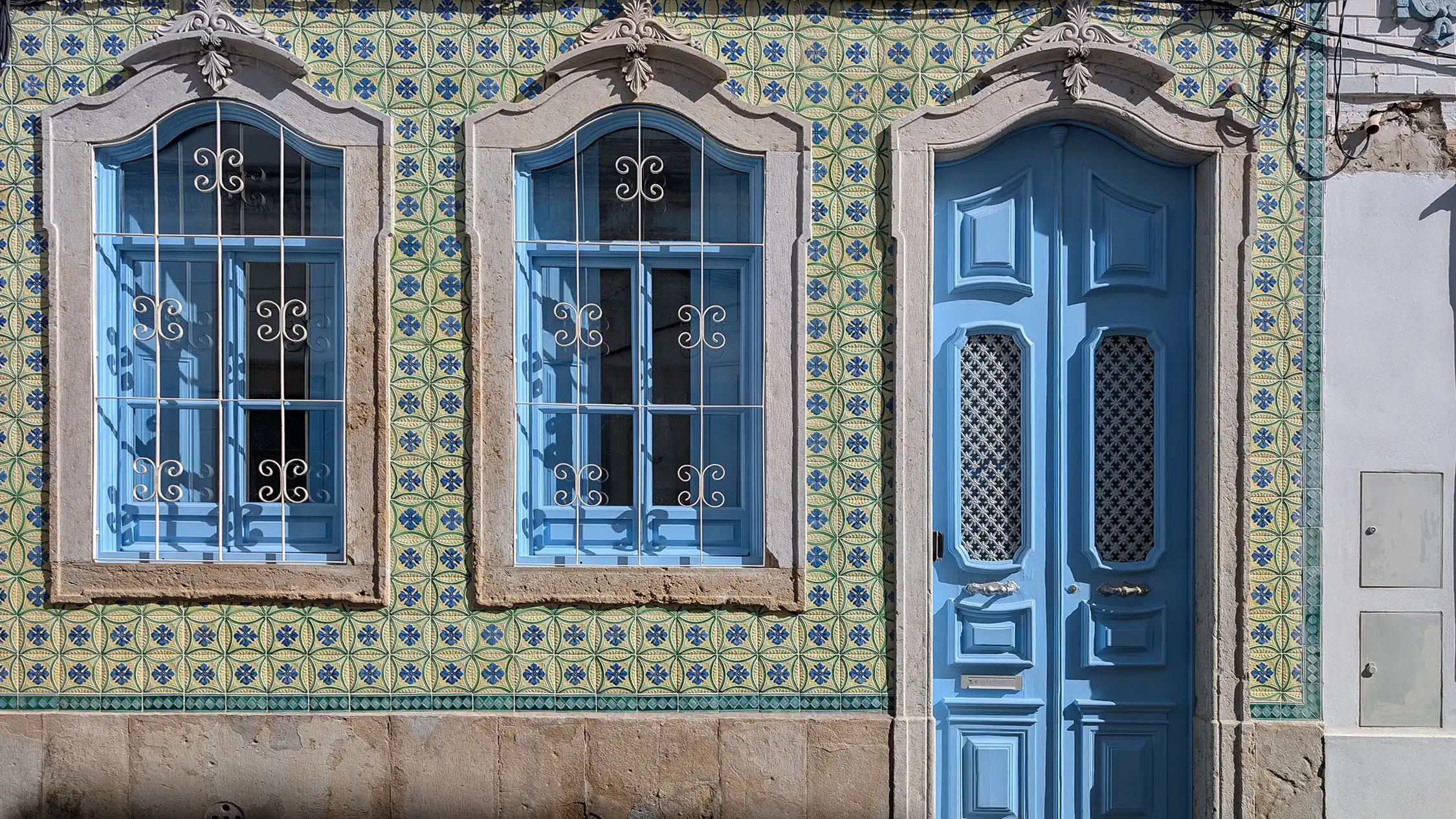 façade with azulejos former fisherman’s house with a pool rustic decor Casa da Brica Portugal