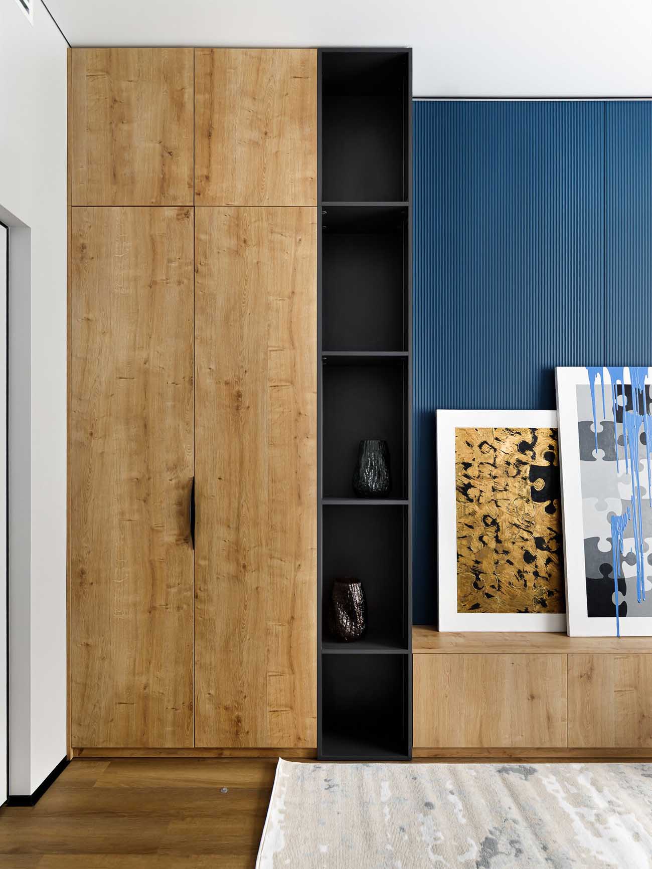 living room with blue wall contemporary decor 57sqm apartment