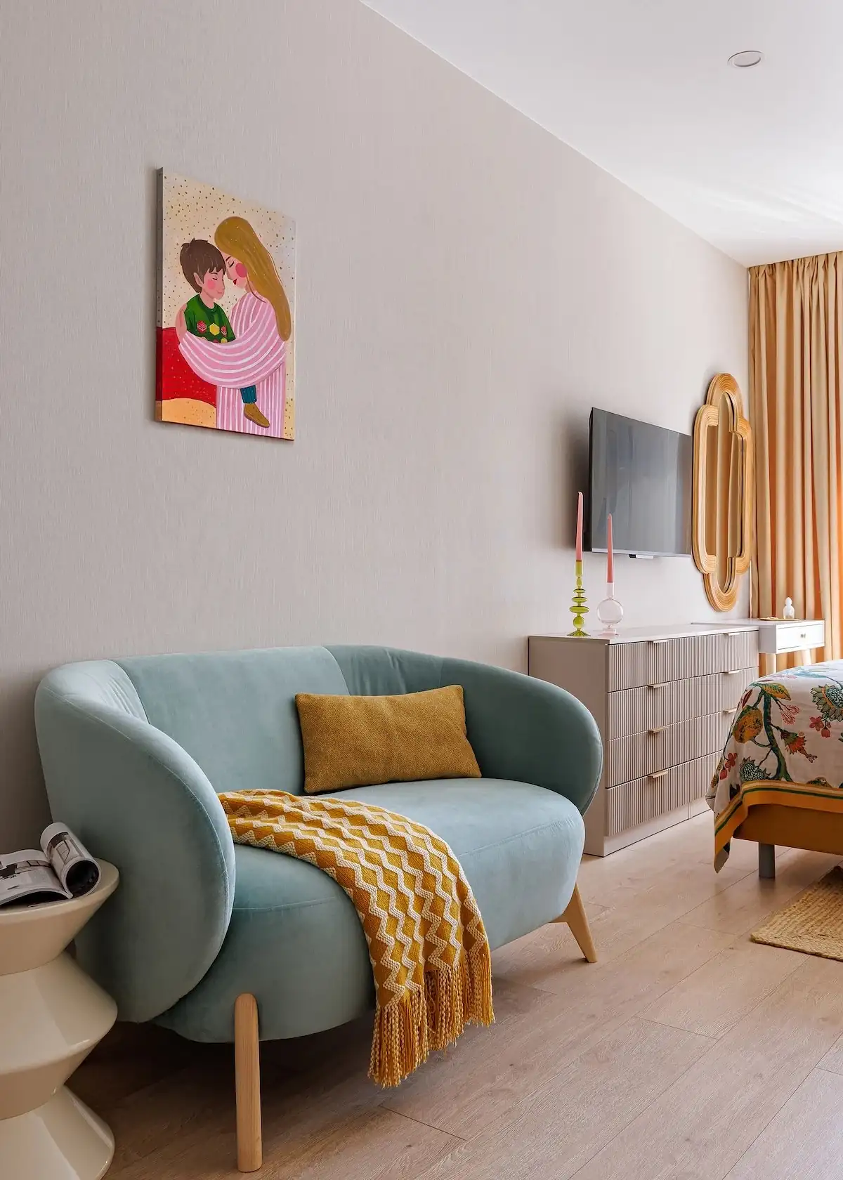 living room space with blue sofa in 26sqm studio flat coloured and contemporary decor living room space with blue sofa in 26sqm studio flat coloured and contemporary decor