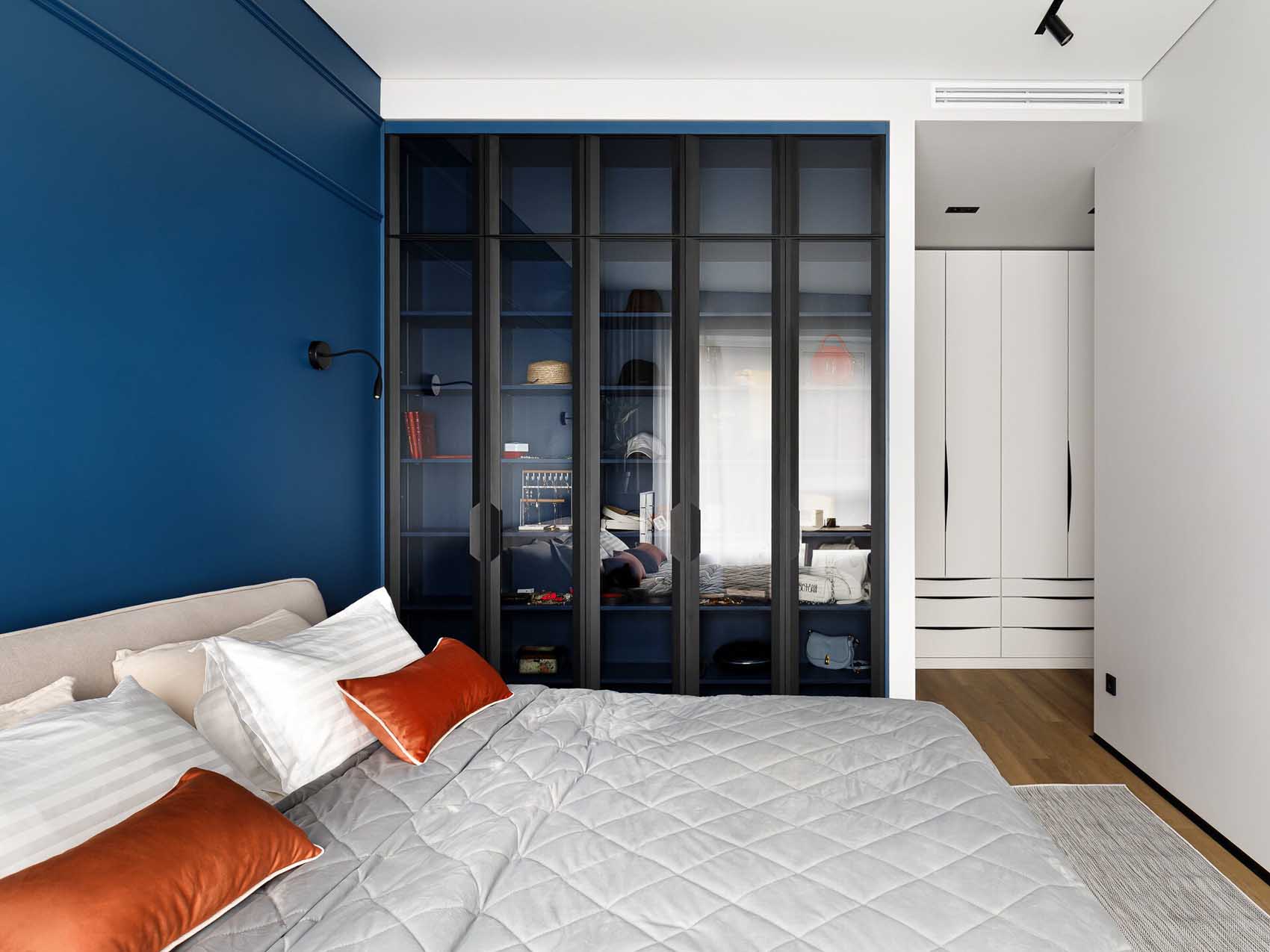 bedroom with blue wall contemporary decor 57sqm apartment