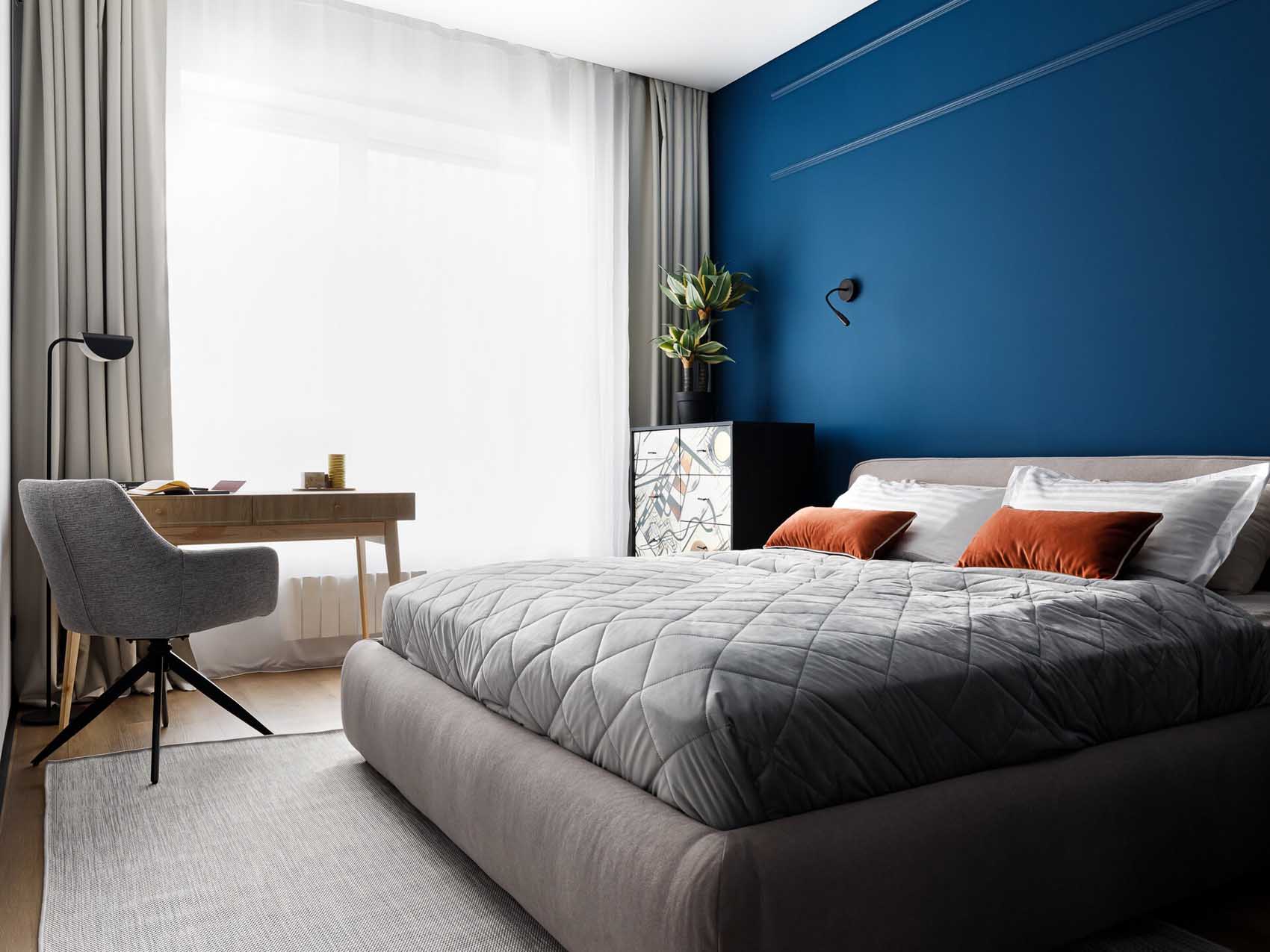 bedroom with blue wall contemporary decor 57sqm apartment home office