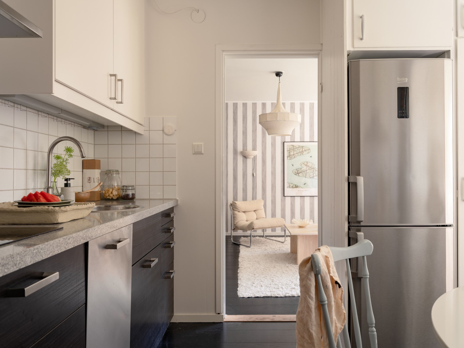 black modern kitchen with dining nook