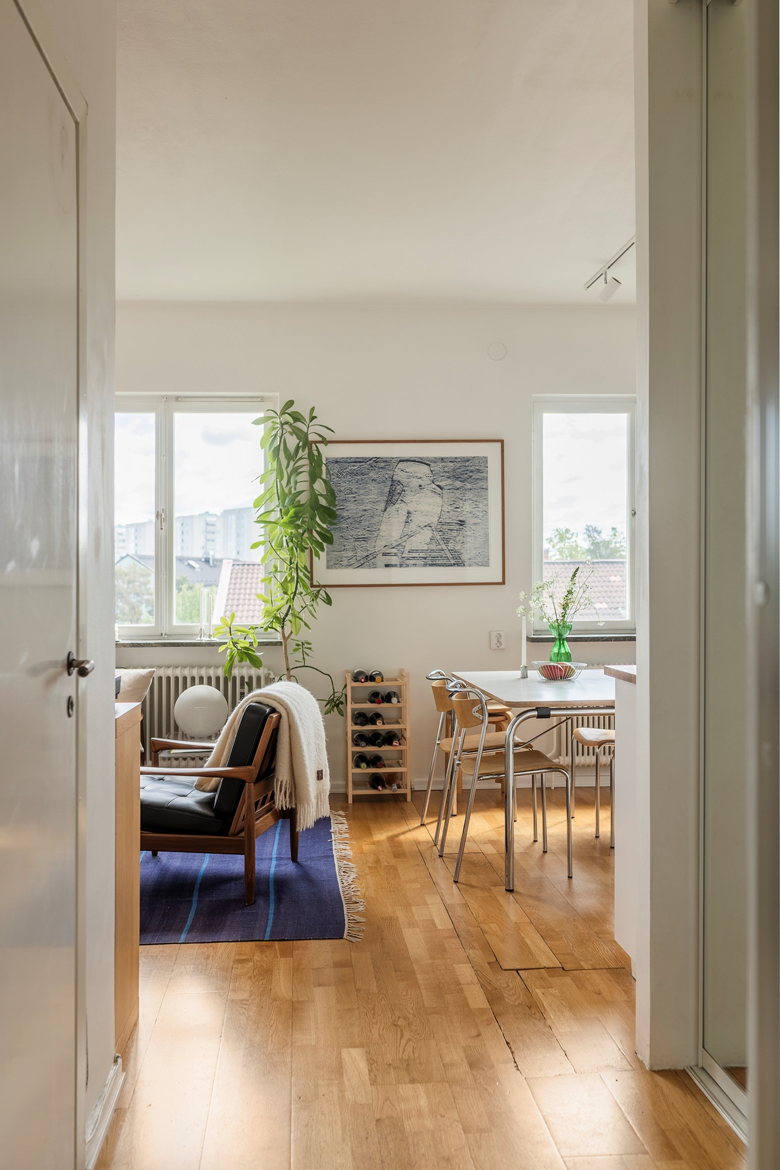entryway with mirrored cupboards