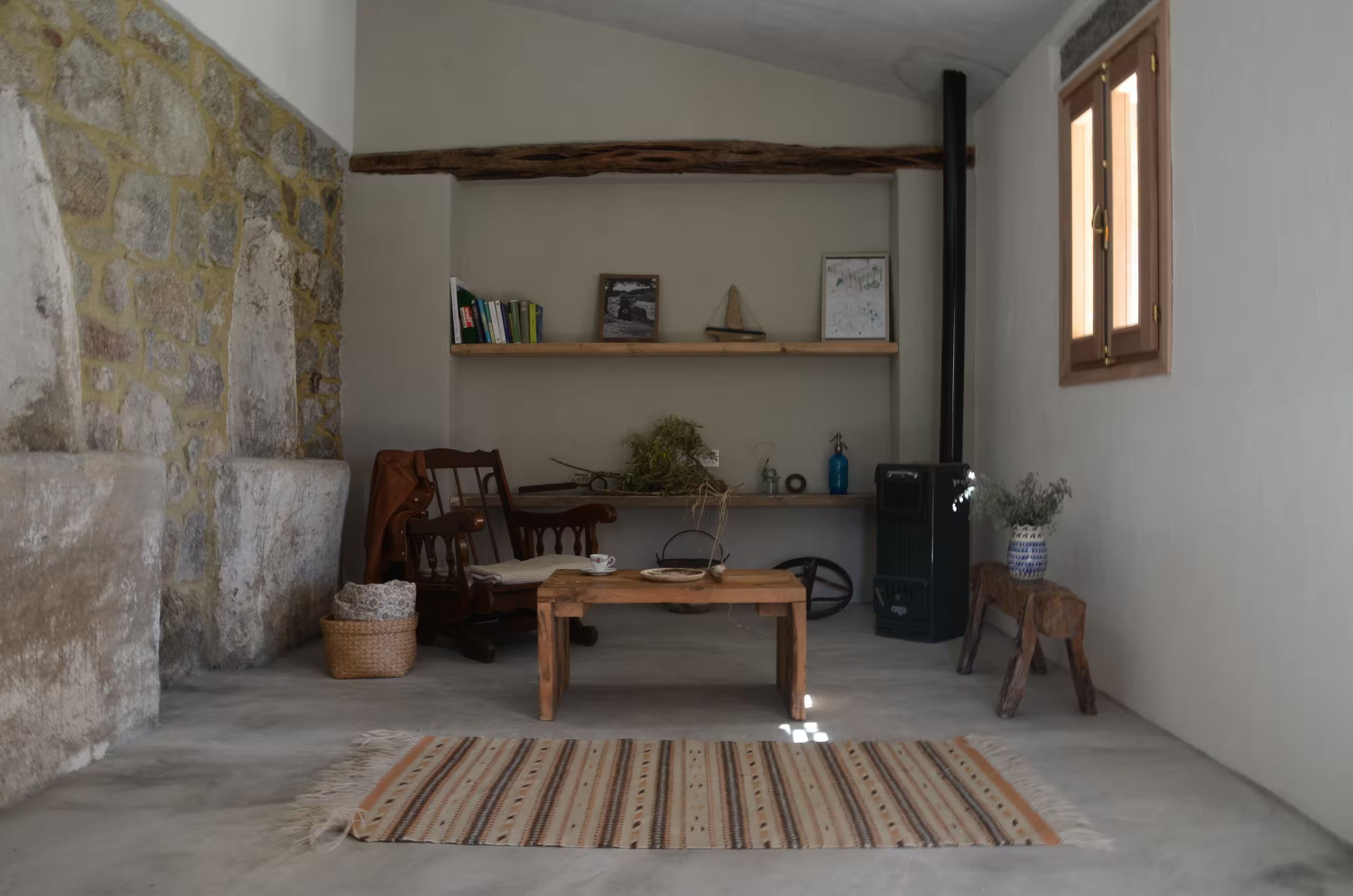 living room with rustic and authentic decor in a historic Sardinian house