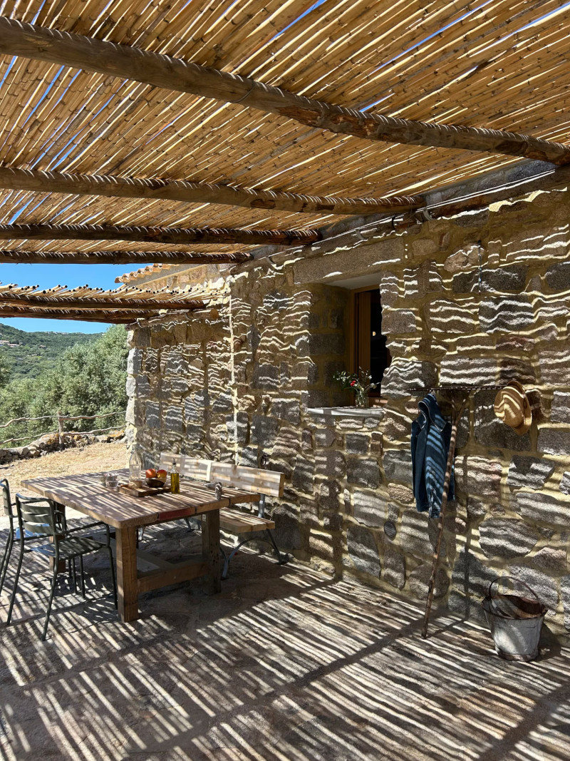 terrace with pergola and canes authentic decor in historic Sardinia house
