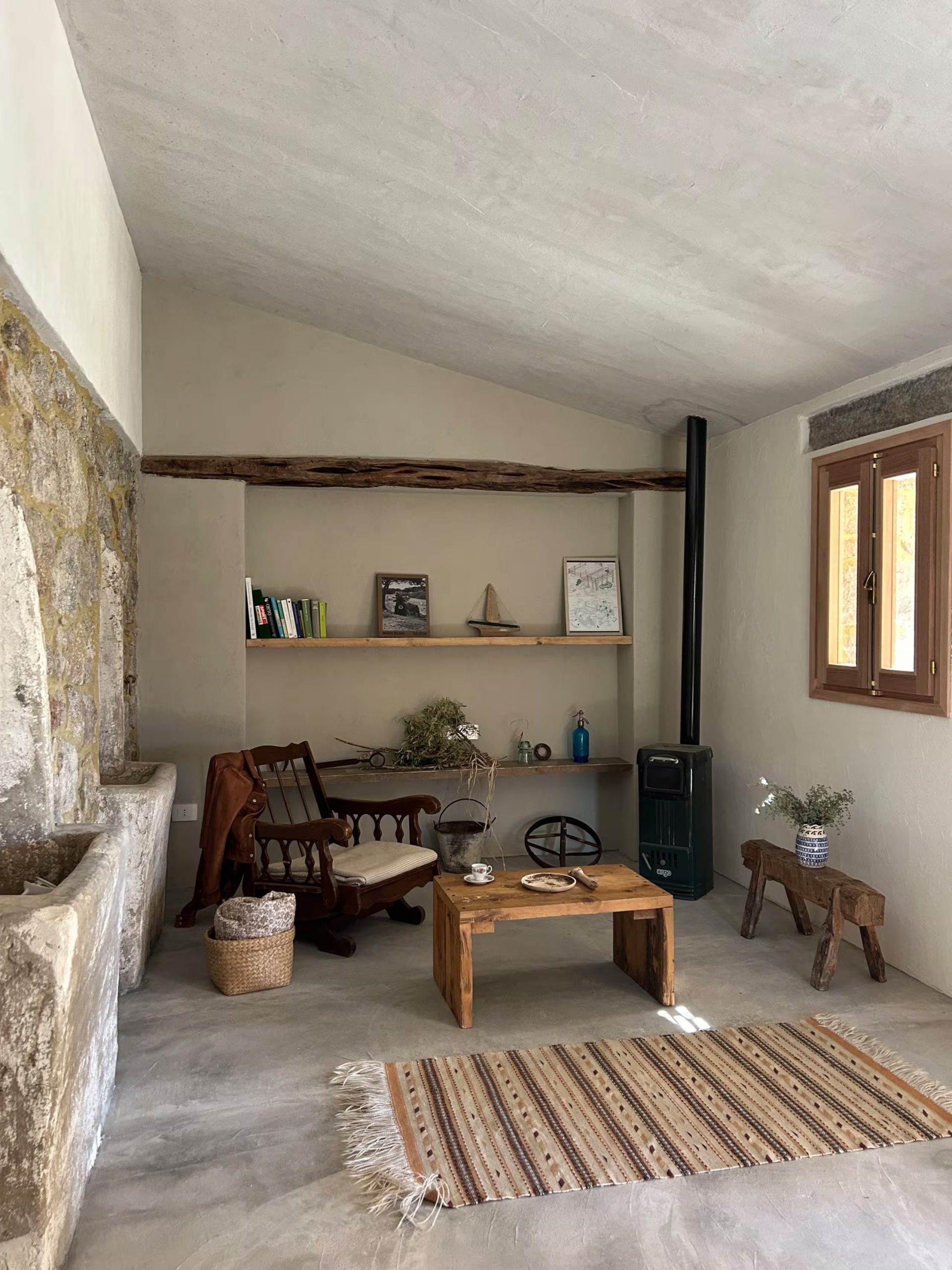 living room with rustic and authentic decor in a historic Sardinian house