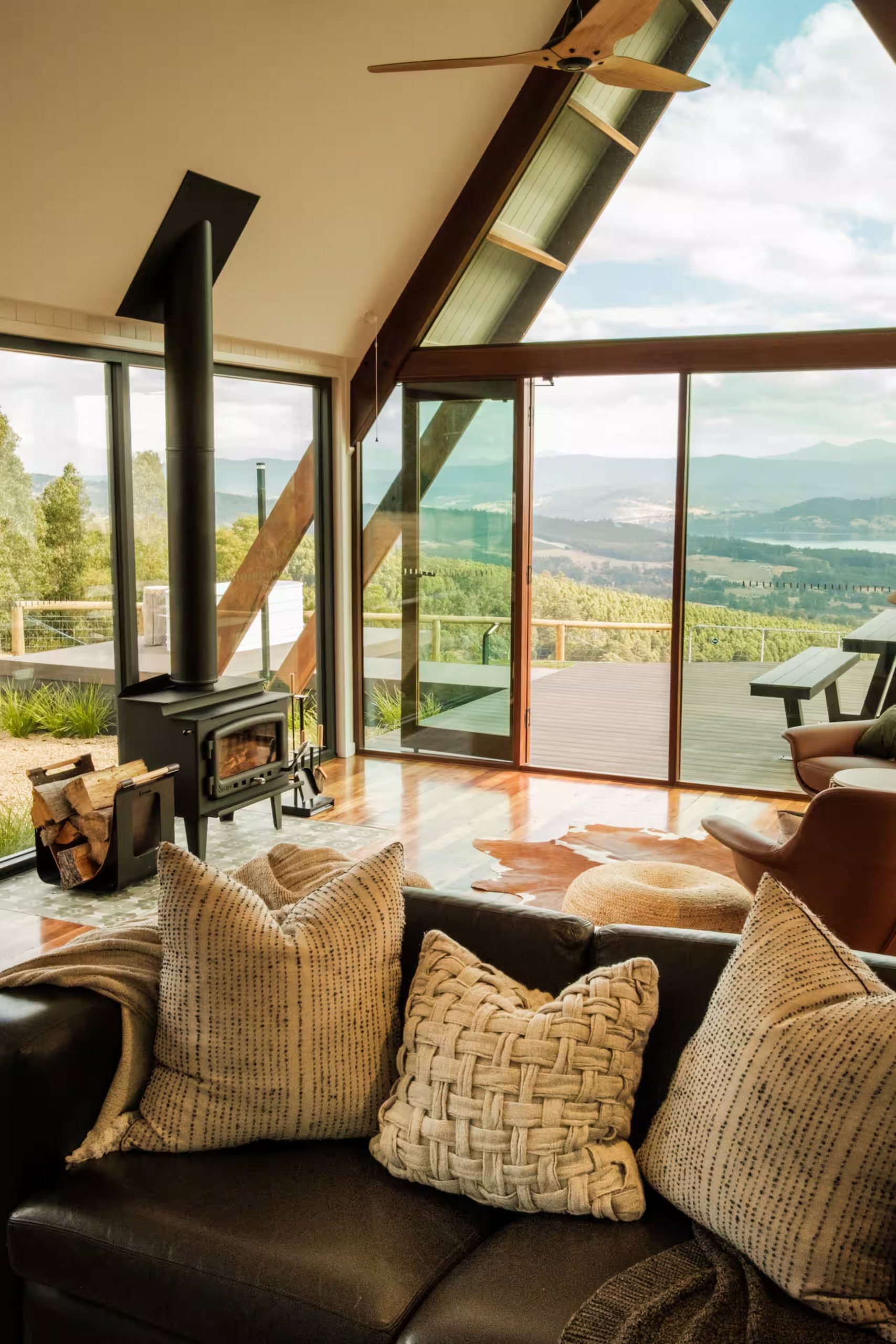 living room off-grid wooden A-Frame house in Tasmania living room off-grid wooden A-Frame house in Tasmania