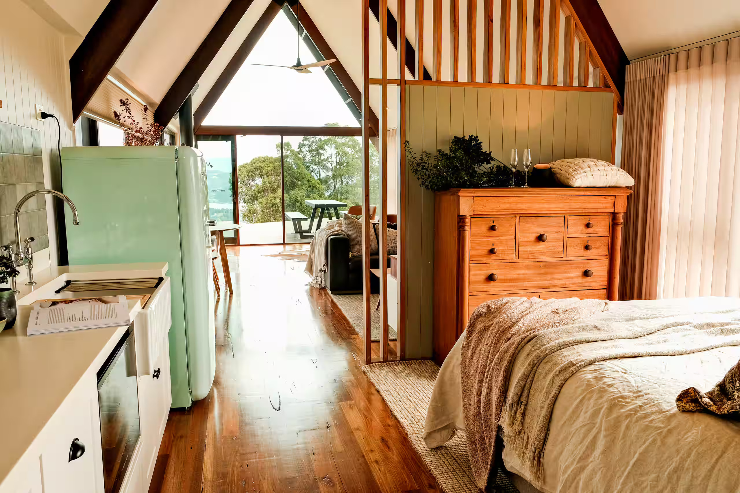 kitchen with mint green vintage Smeg fridge and bedroom kitchen with mint green vintage Smeg fridge and bedroom