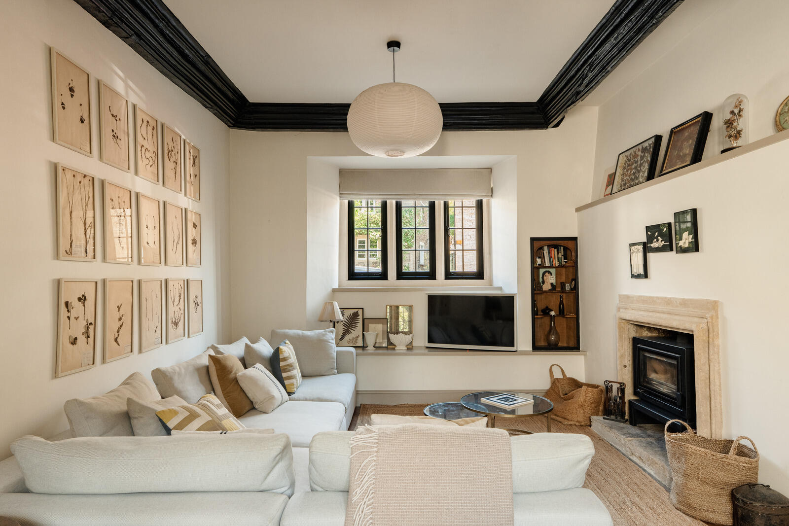 beige living room with fireplace and beams classic chic decor Tudor-style village house beige living room with fireplace and beams classic chic decor Tudor-style village house