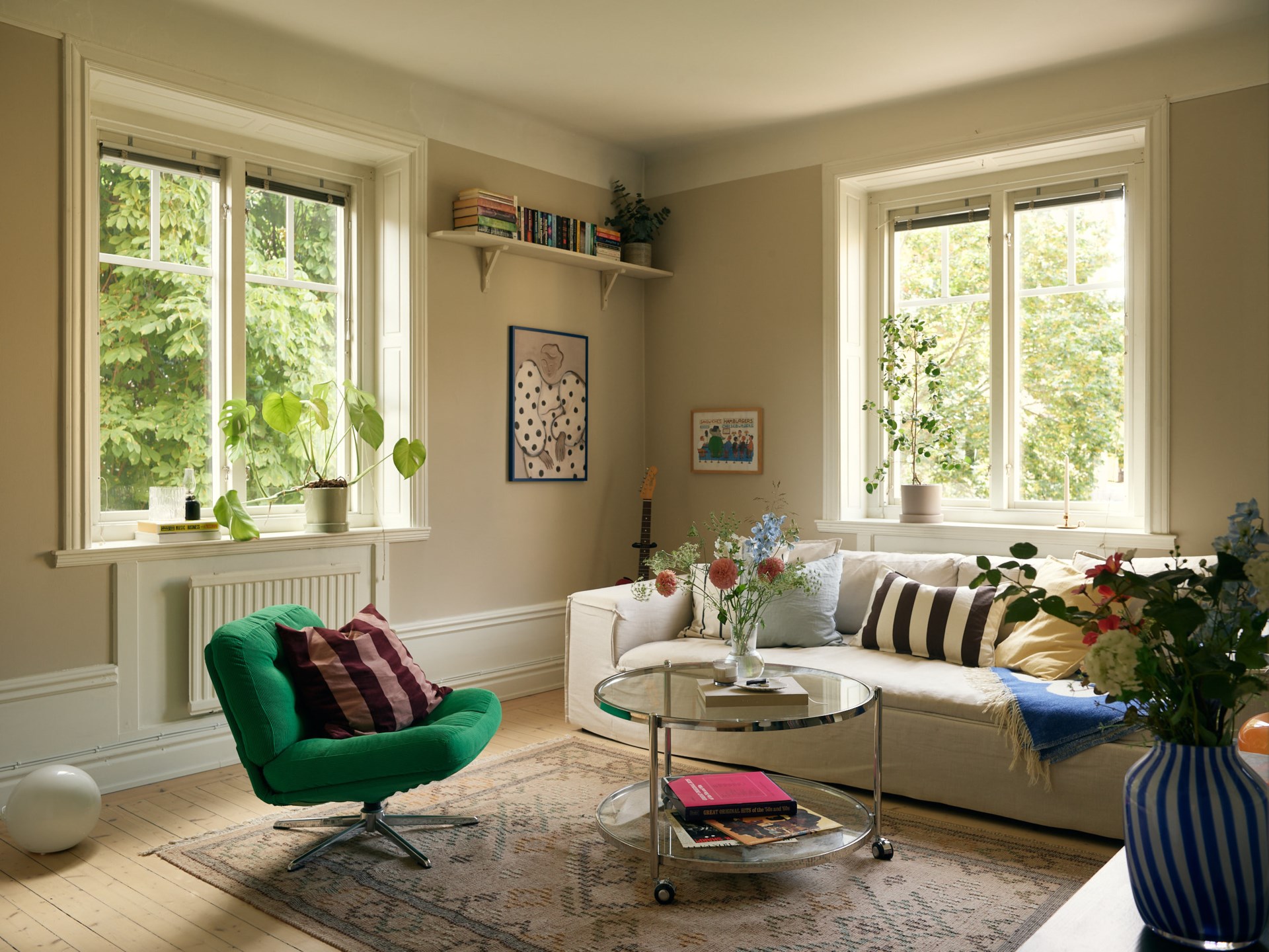 living room with green IKEA vintage armchair 58sqm apartment Scandinavian decor