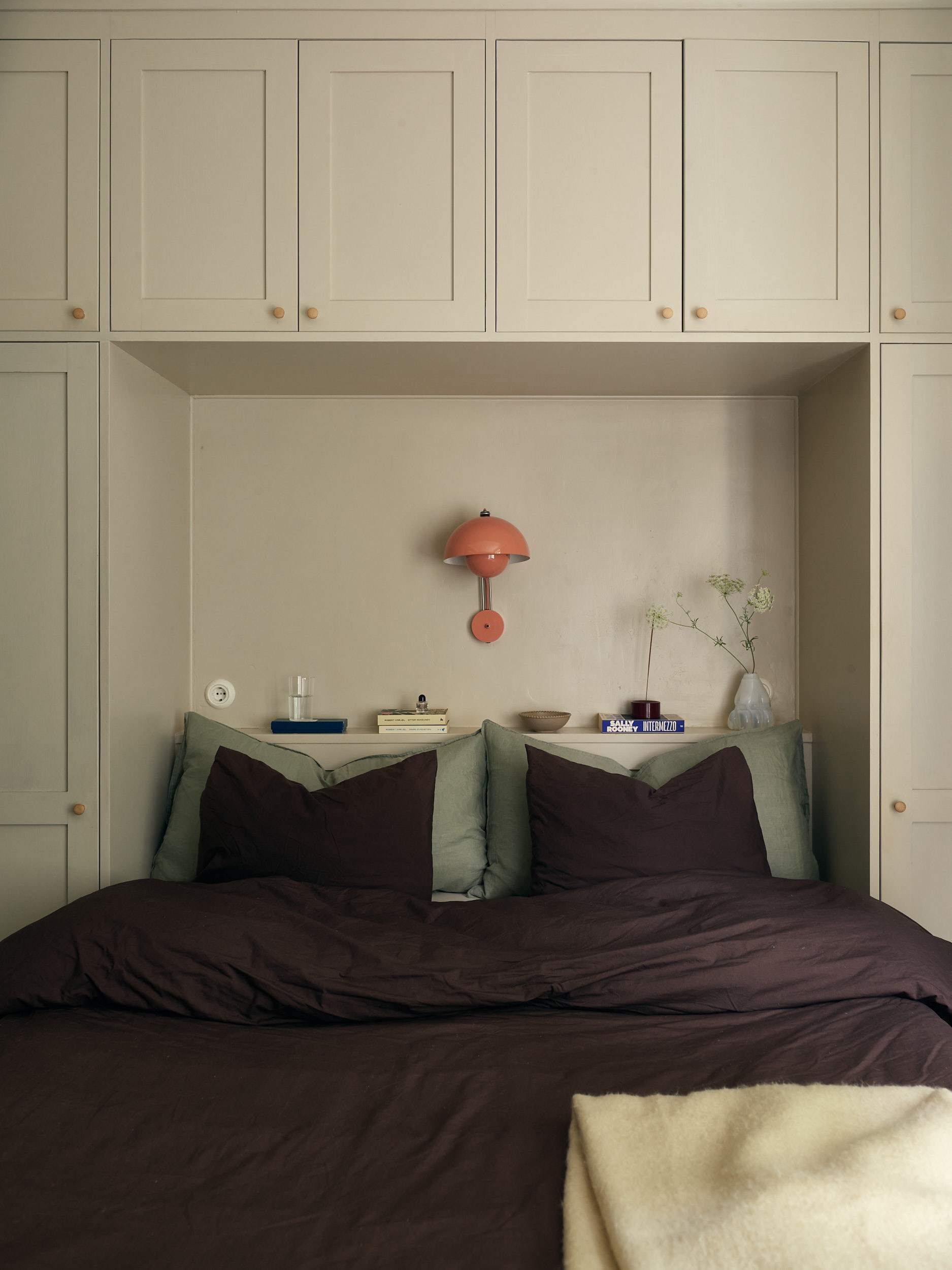 bedroom with bridge-style cabinet 58sqm apartment Scandinavian decor