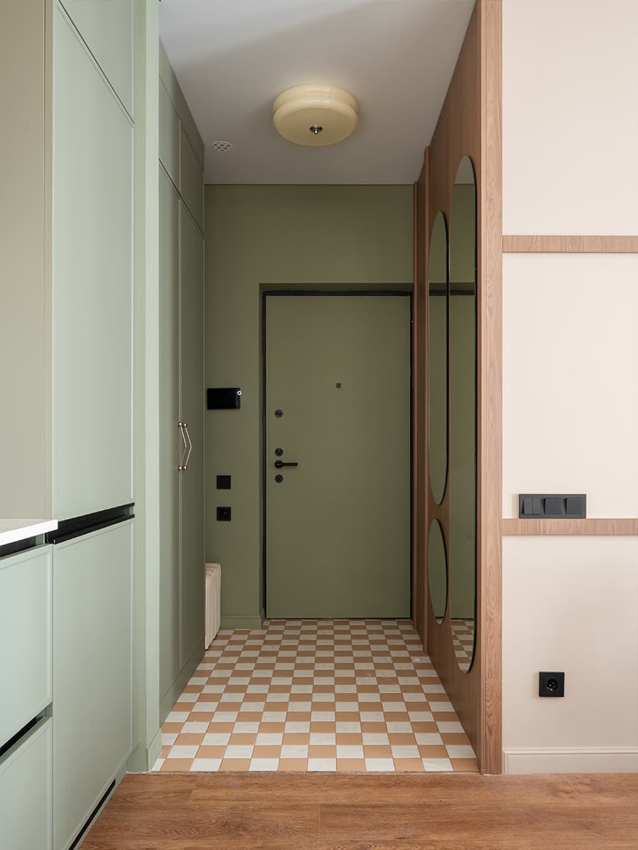 entrée sol à damier murs vert décoration contemporaine petit appartement de 42m2