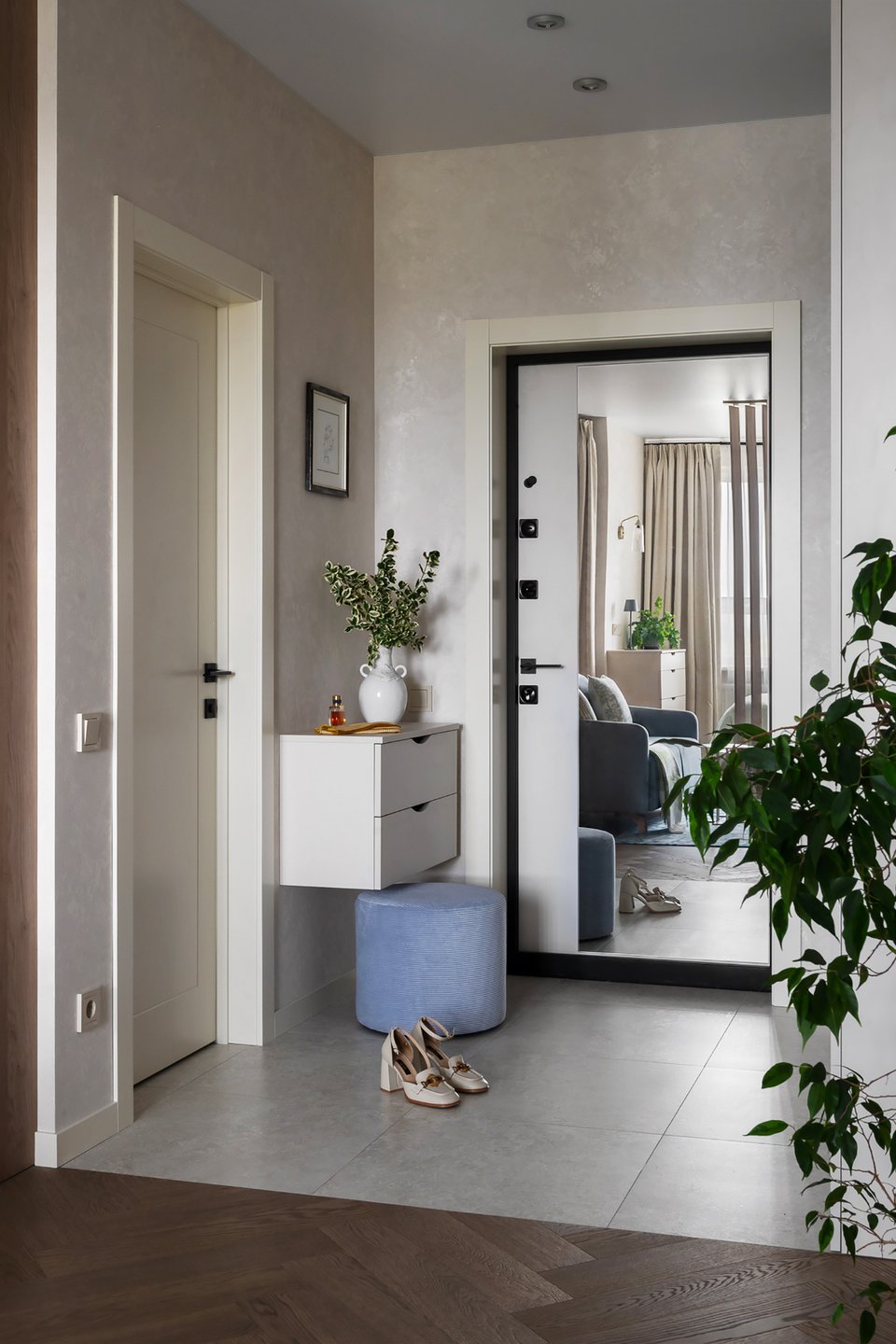 entryway with large mirror
