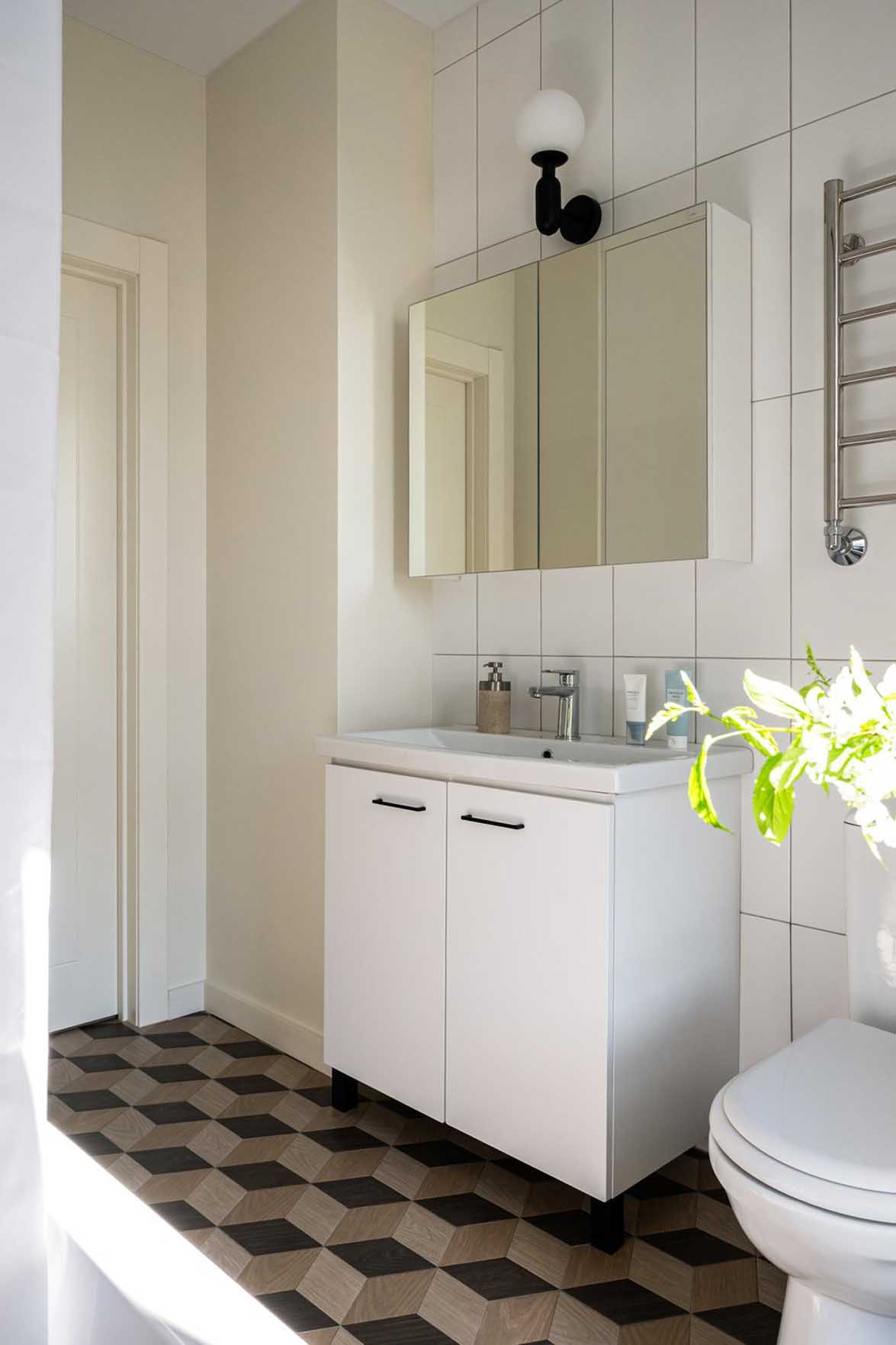 modern bathroom with cement tiles on the floor