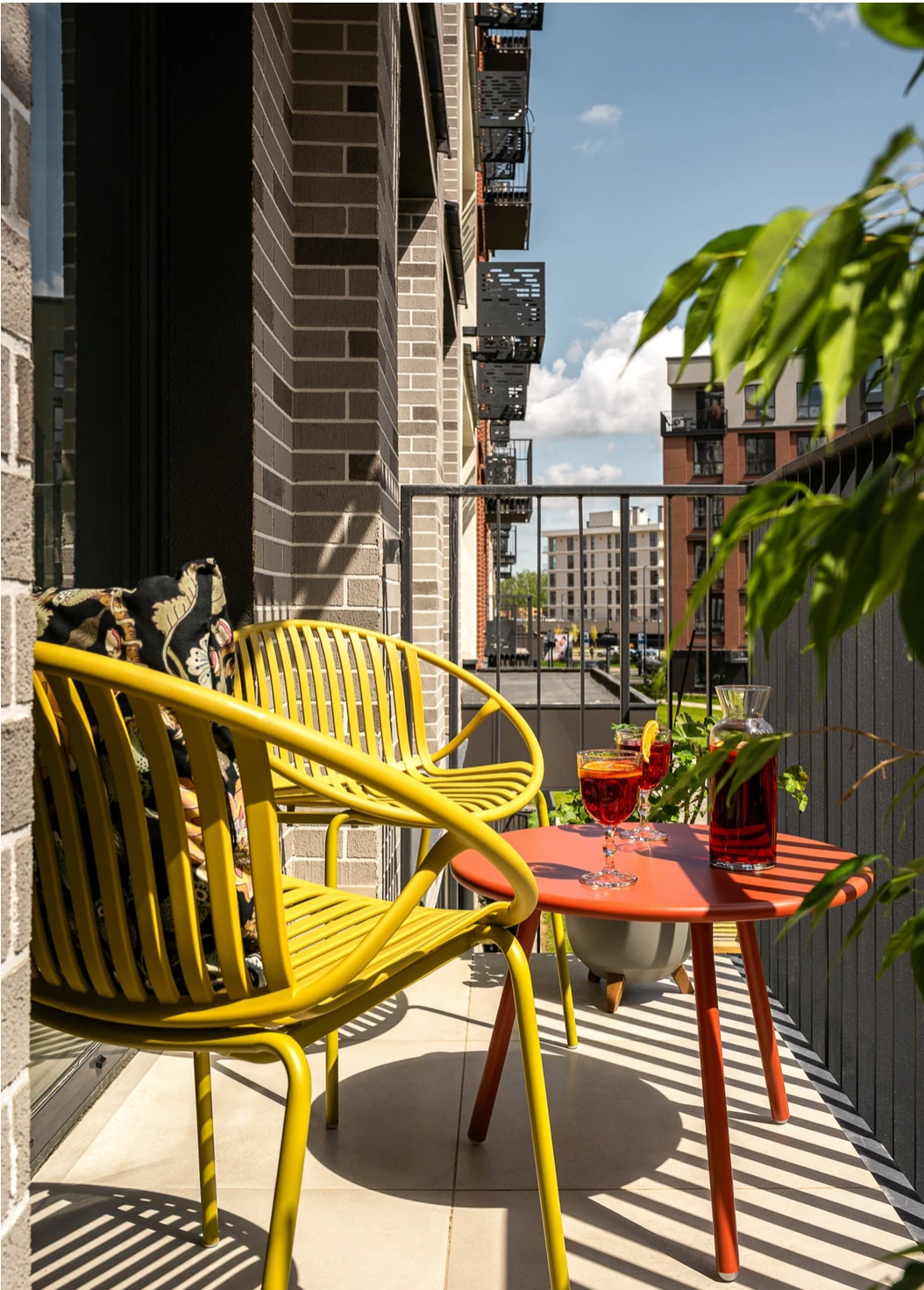 balcony with yellow armchairs