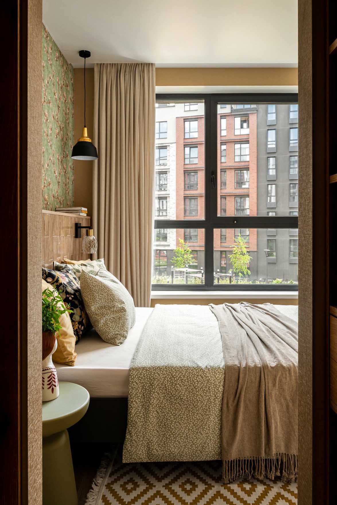 bedroom with wallpaper