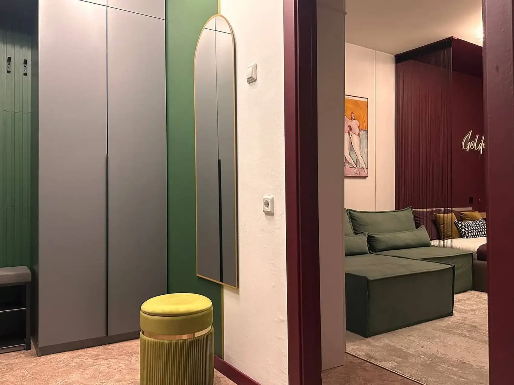 entrance and living room in green and burgundy 37sqm studio contemporary decor entrance and living room in green and burgundy 37sqm studio contemporary decor