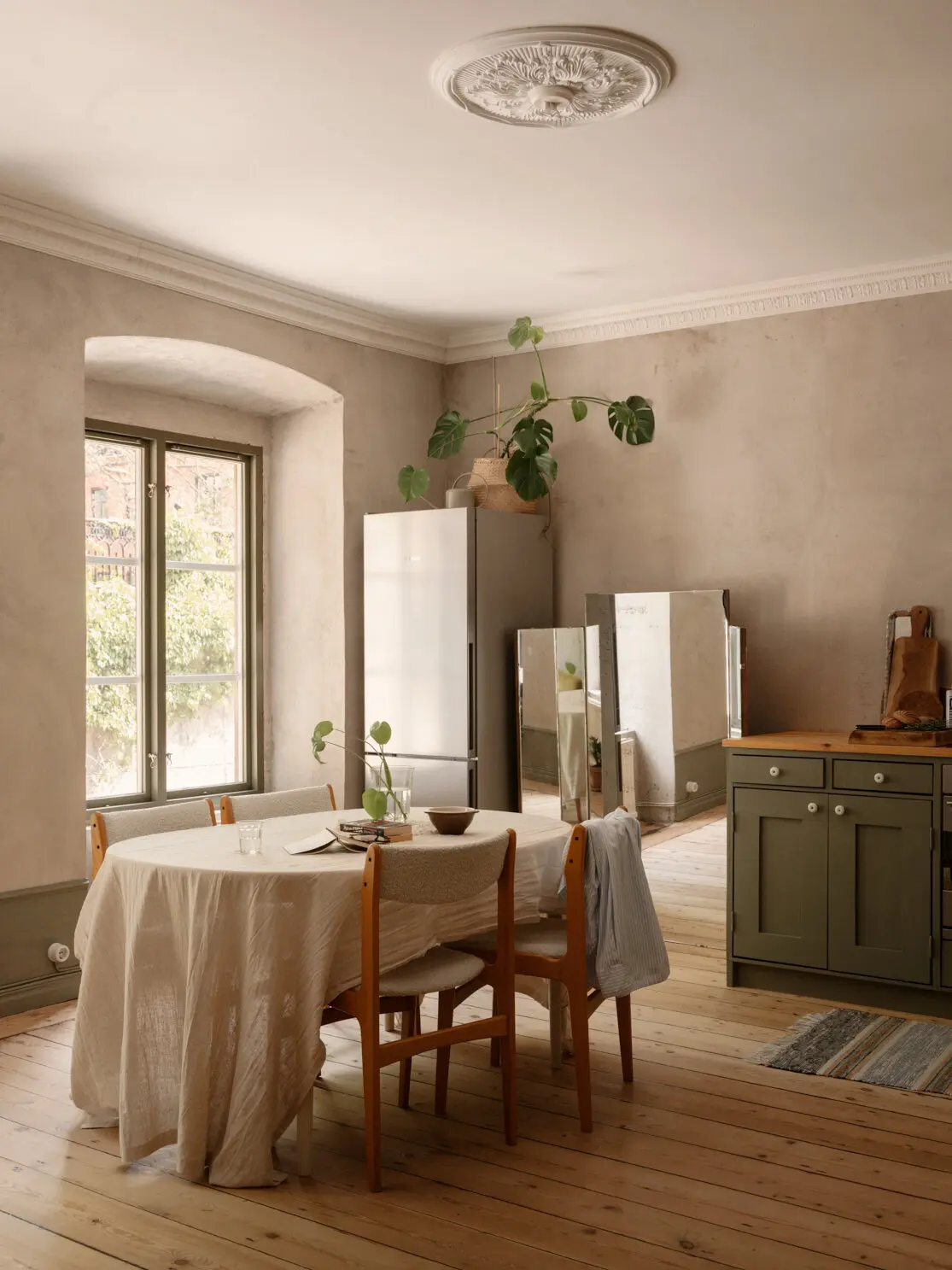 dining room and sage green shaker style kitchen 56sqm apartement Scandinavian decor