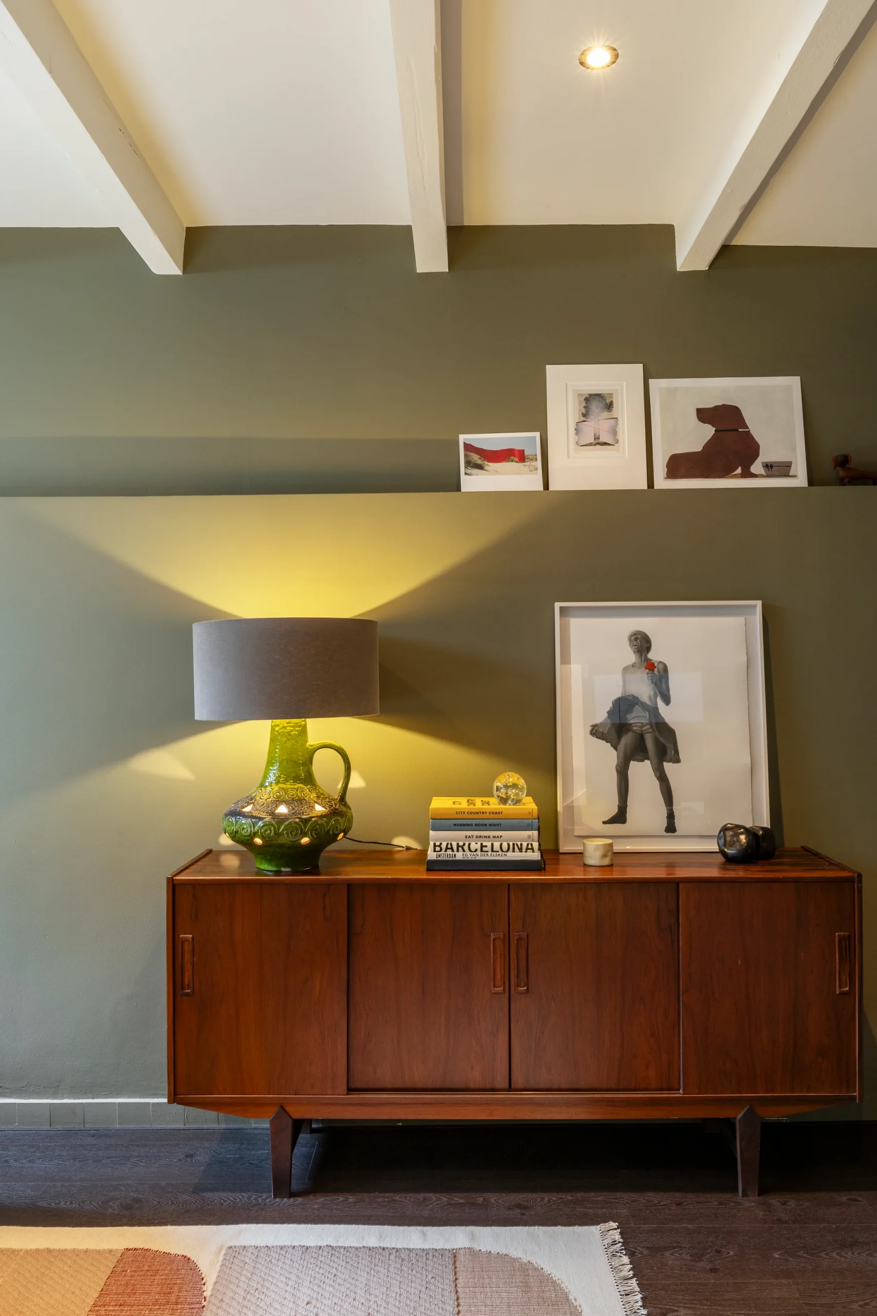 bedroom with green walls in the basement 191sqm duplex apartment contemporary decor Amsterdam