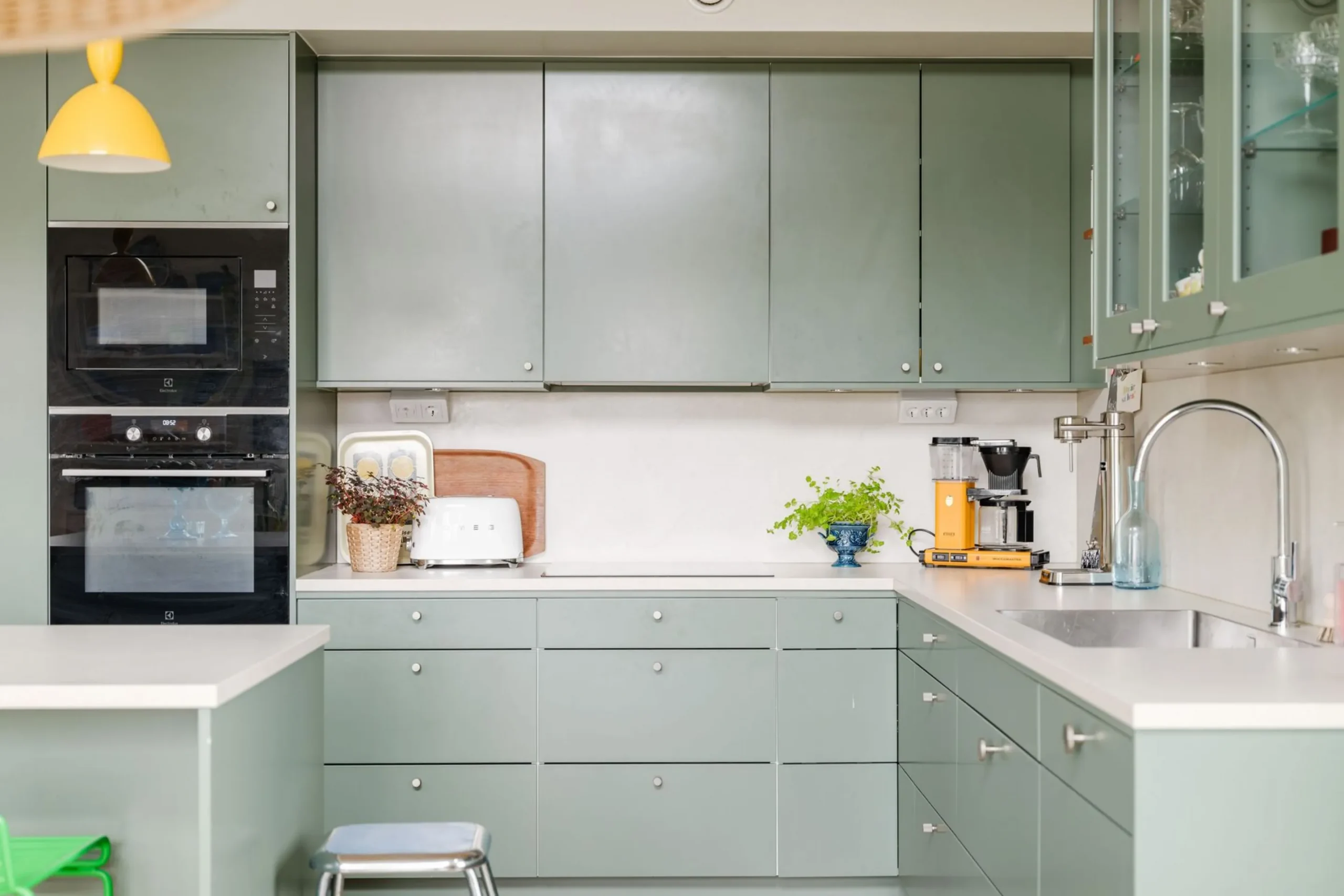 green open kitchen in a duplex apartment contemporary decor