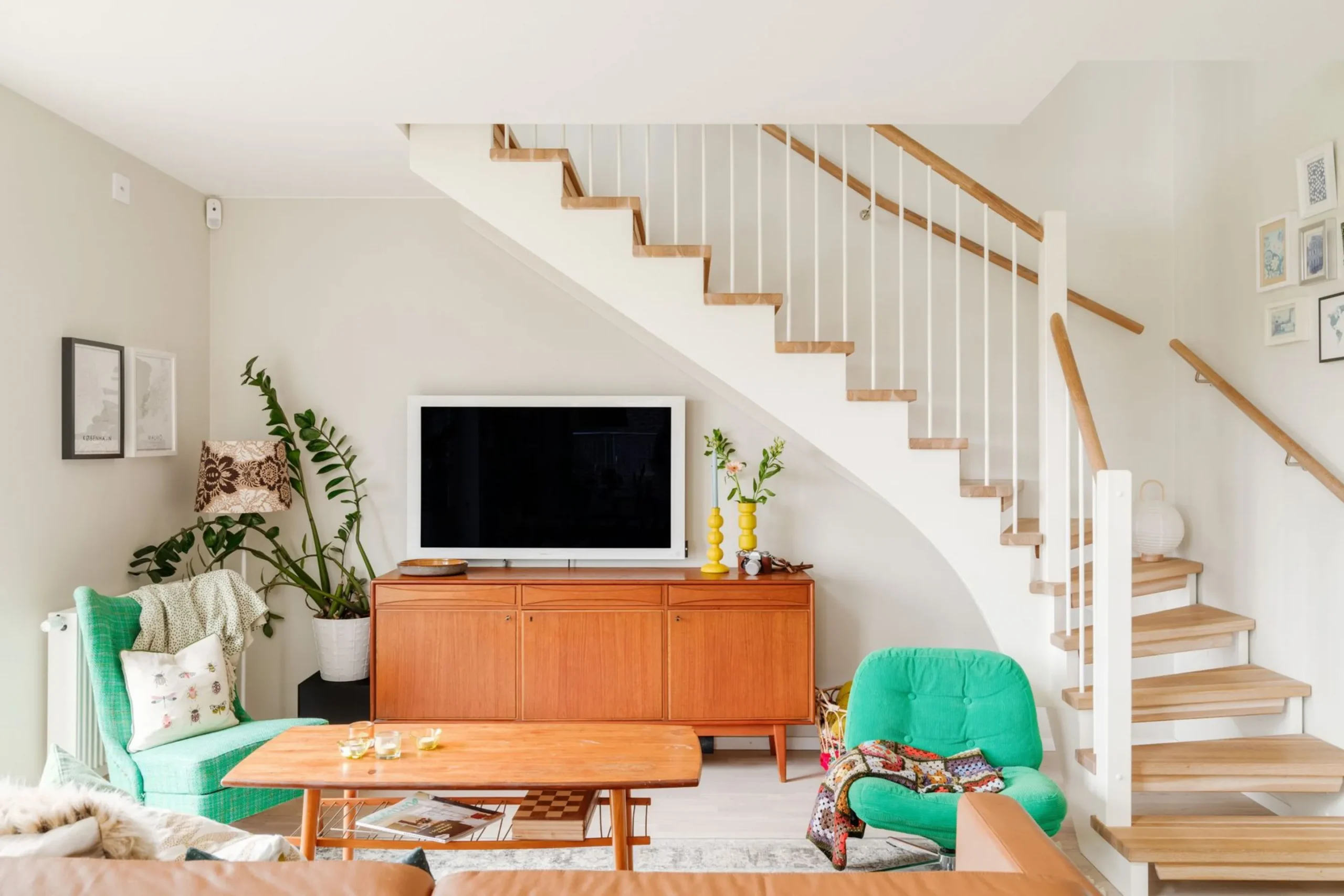 living room with staircase in a duplex apartment contemporary decor